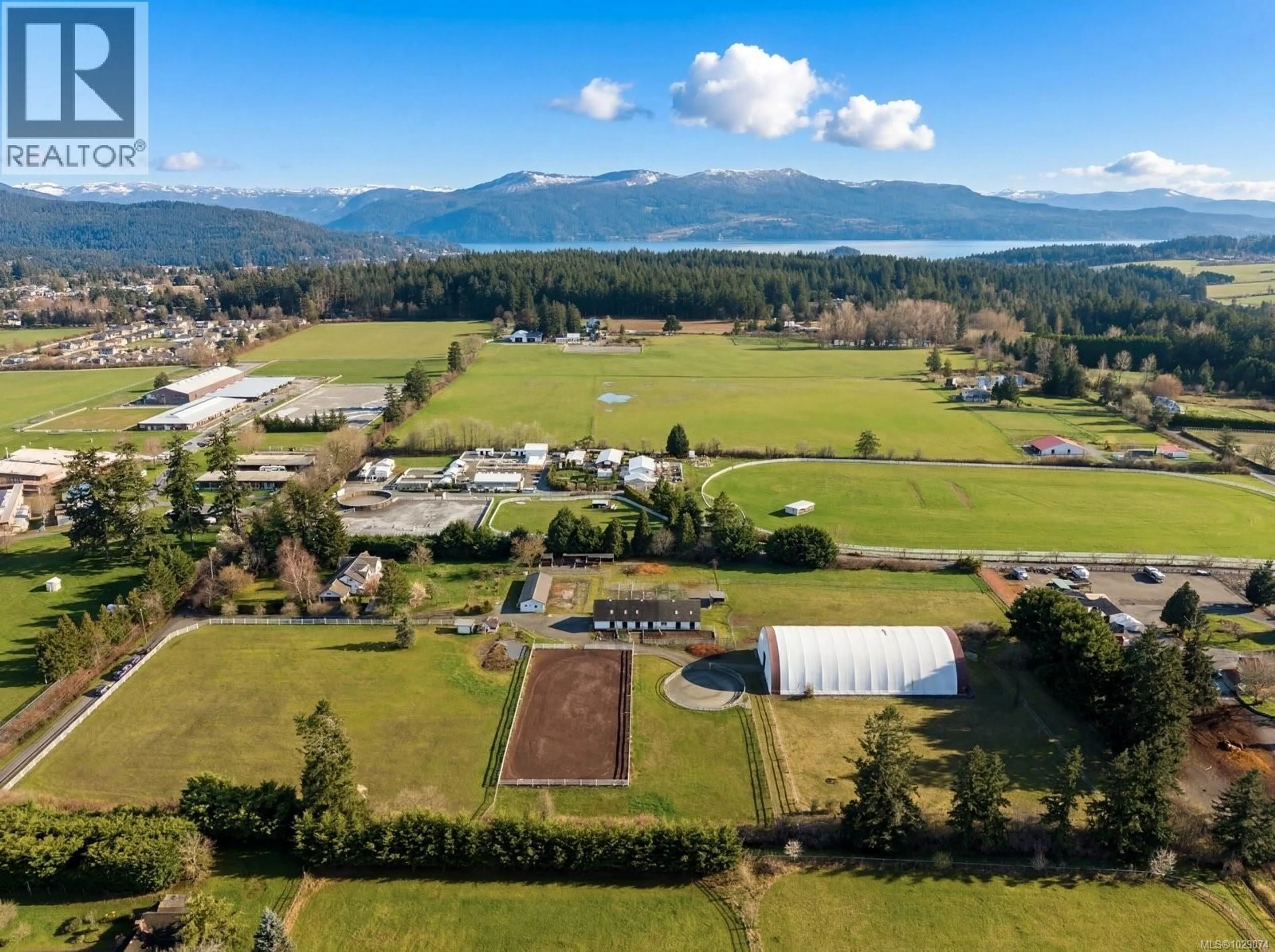 A pic from outside/outdoor area/front of a property/back of a property/a pic from drone, mountain view for 1584 WHITE ROAD, Central Saanich British Columbia V8M1S8