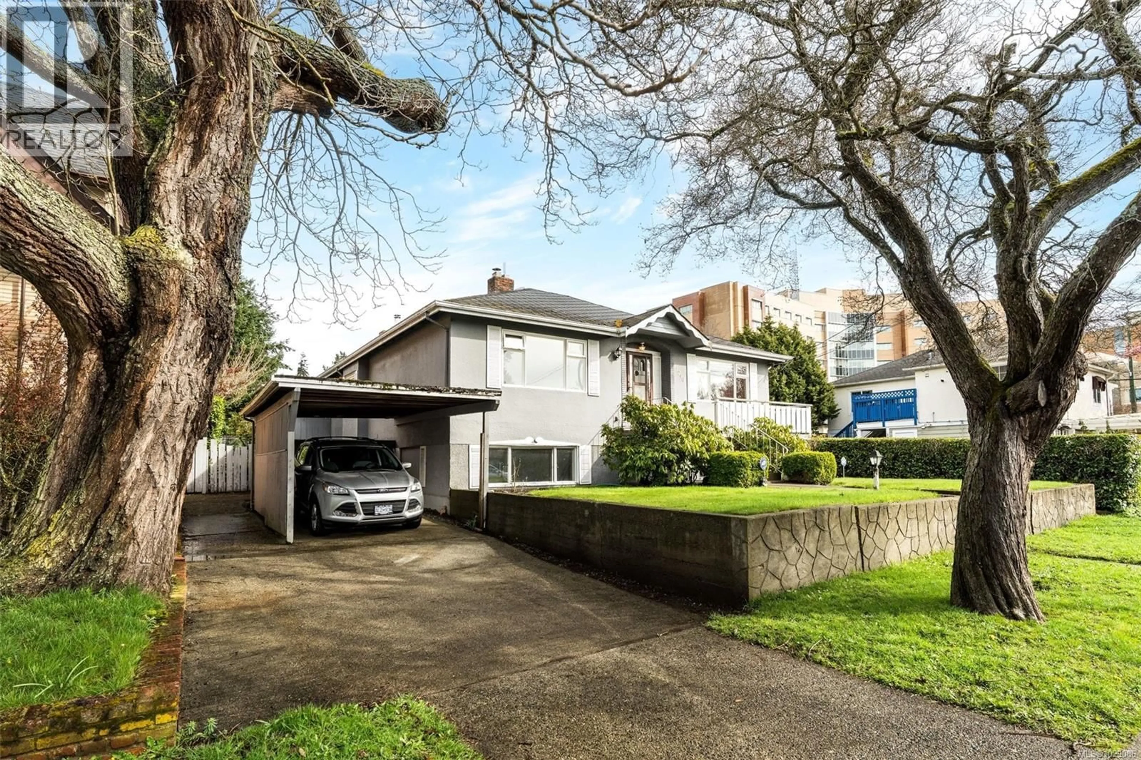 A pic from outside/outdoor area/front of a property/back of a property/a pic from drone, street for 1790 DENMAN STREET, Victoria British Columbia V8R1Y4