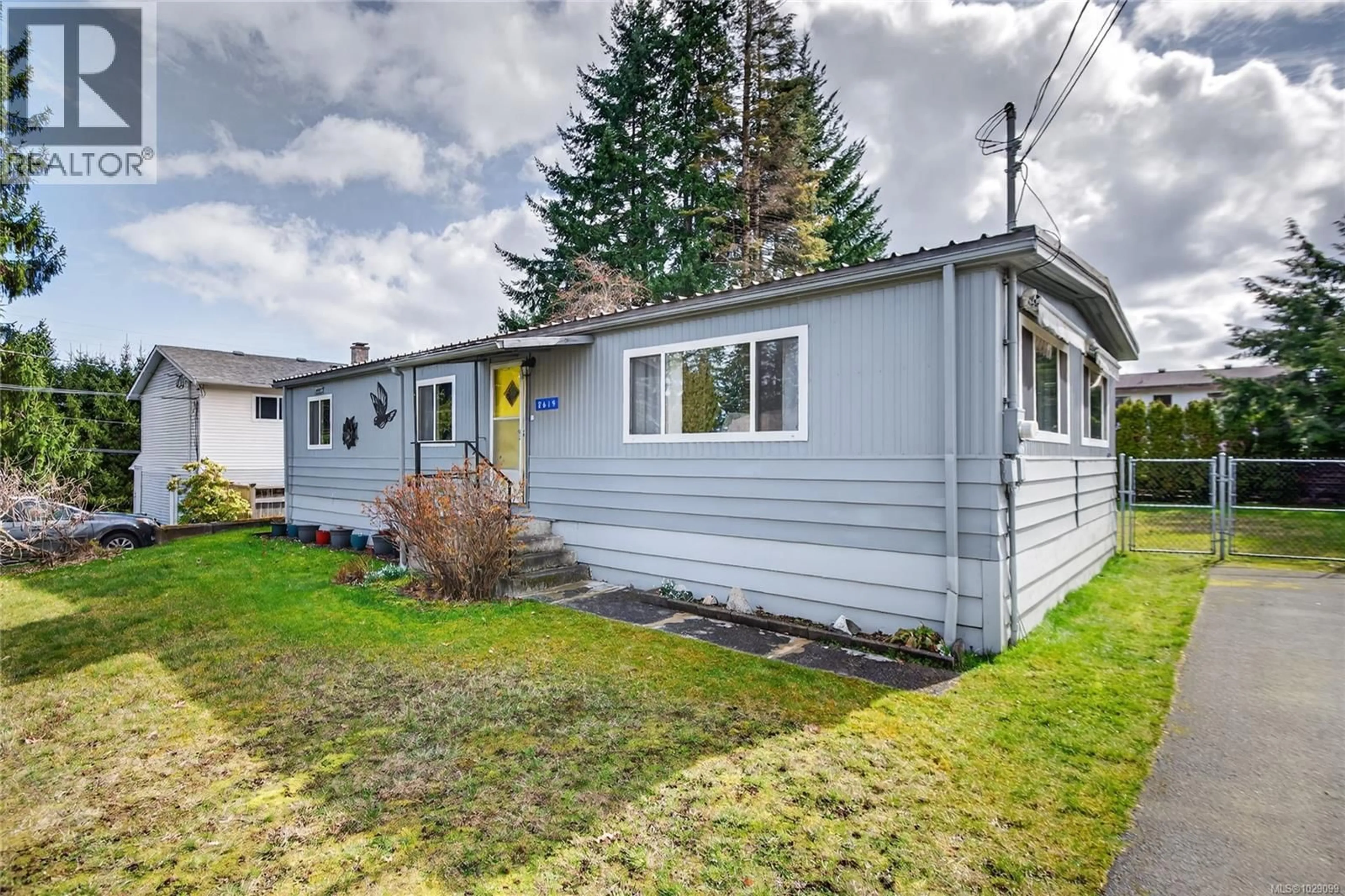 Home with vinyl exterior material, street for 2619 ULVERSTON AVENUE, Cumberland British Columbia V0R1S0