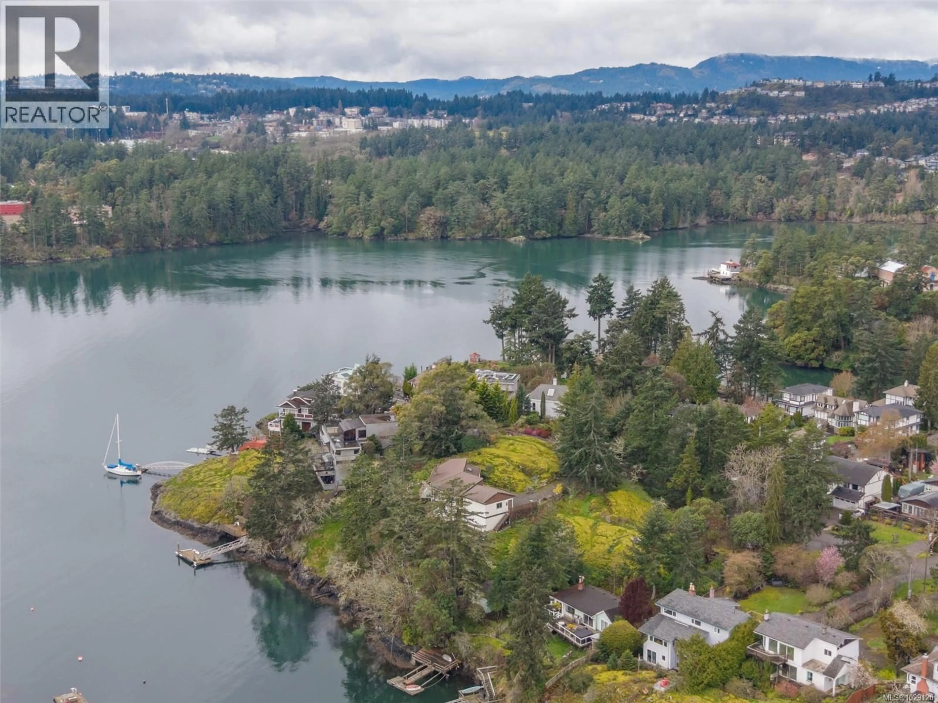 A pic from outside/outdoor area/front of a property/back of a property/a pic from drone, water/lake/river/ocean view for 312 BESSBOROUGH AVENUE, View Royal British Columbia V9B1T7