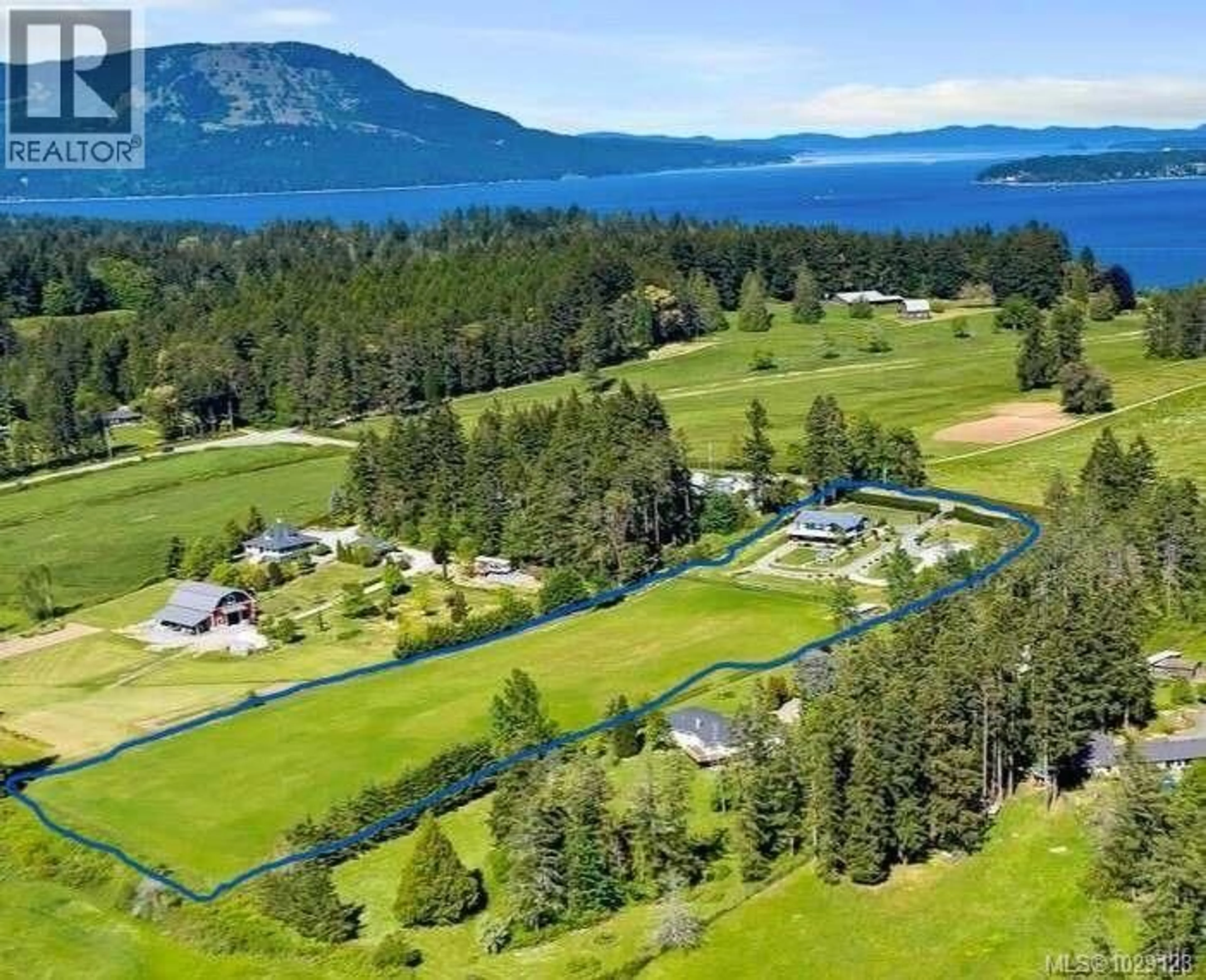 A pic from outside/outdoor area/front of a property/back of a property/a pic from drone, water/lake/river/ocean view for 612 KILMALU ROAD, Mill Bay British Columbia V8H1E3