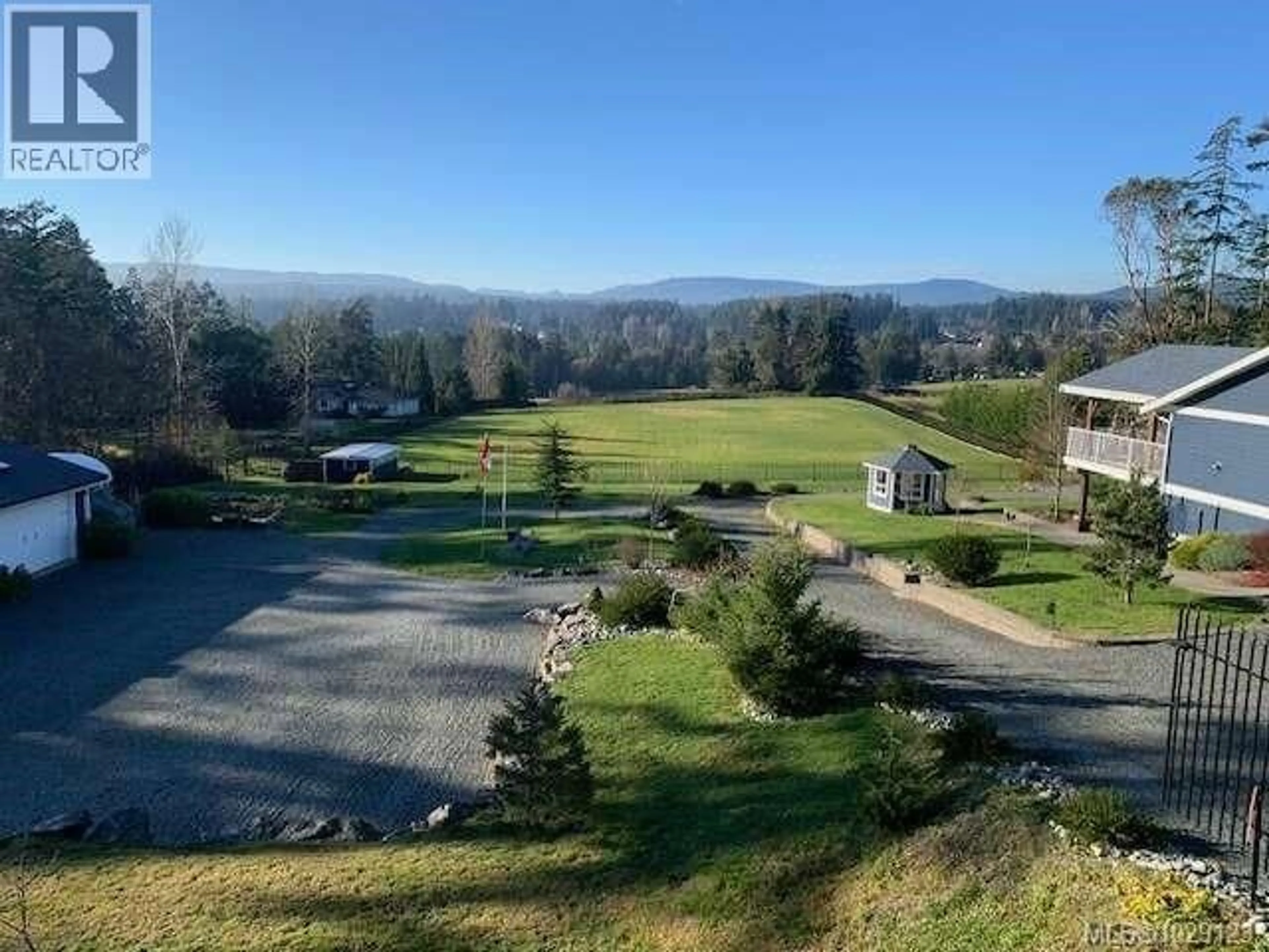 A pic from outside/outdoor area/front of a property/back of a property/a pic from drone, mountain view for 612 KILMALU ROAD, Mill Bay British Columbia V8H1E3