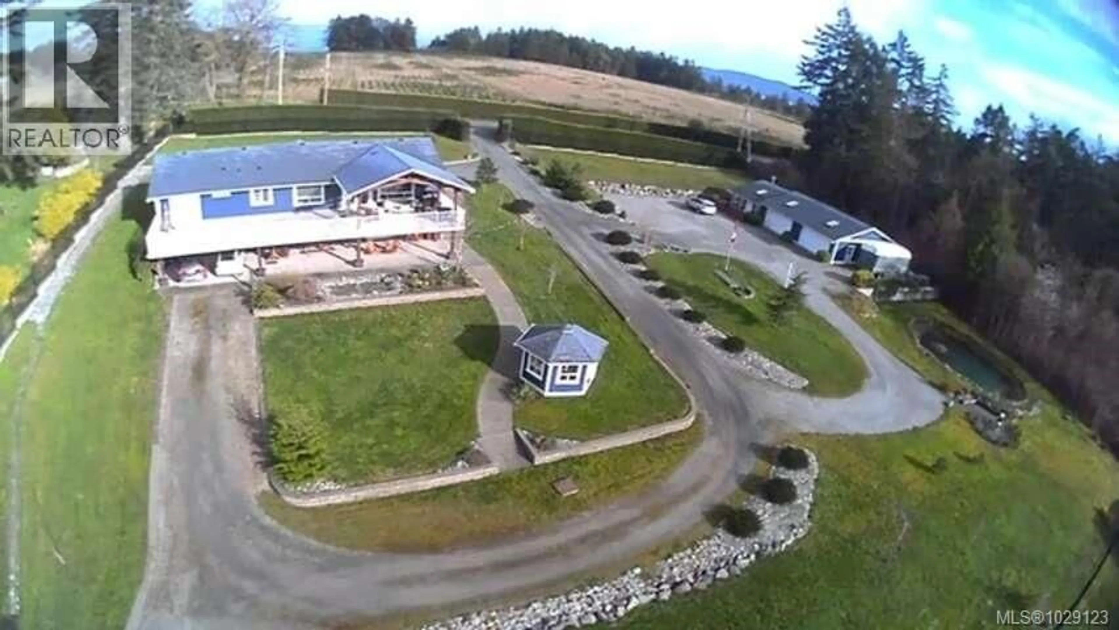 A pic from outside/outdoor area/front of a property/back of a property/a pic from drone, unknown for 612 KILMALU ROAD, Mill Bay British Columbia V8H1E3