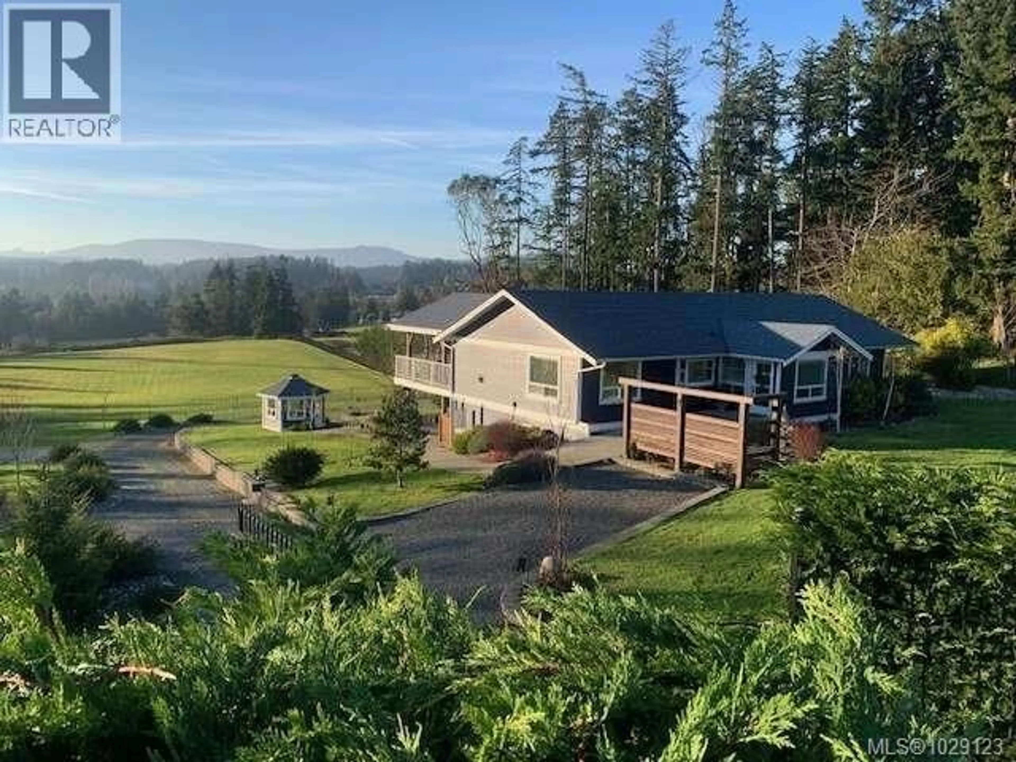 A pic from outside/outdoor area/front of a property/back of a property/a pic from drone, mountain view for 612 KILMALU ROAD, Mill Bay British Columbia V8H1E3