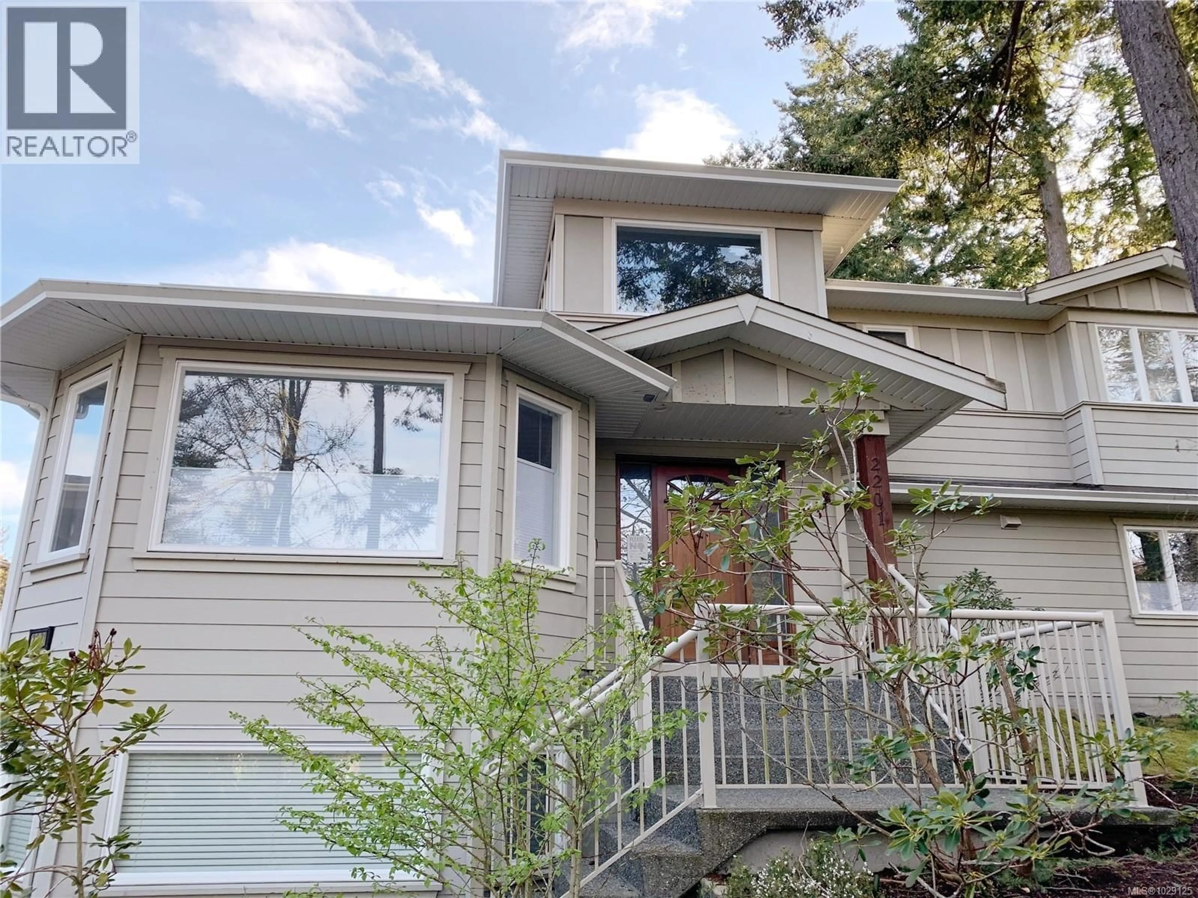 Home with vinyl exterior material, street for 2201 ARBUTUS COVE LANE, Saanich British Columbia V8N6N7