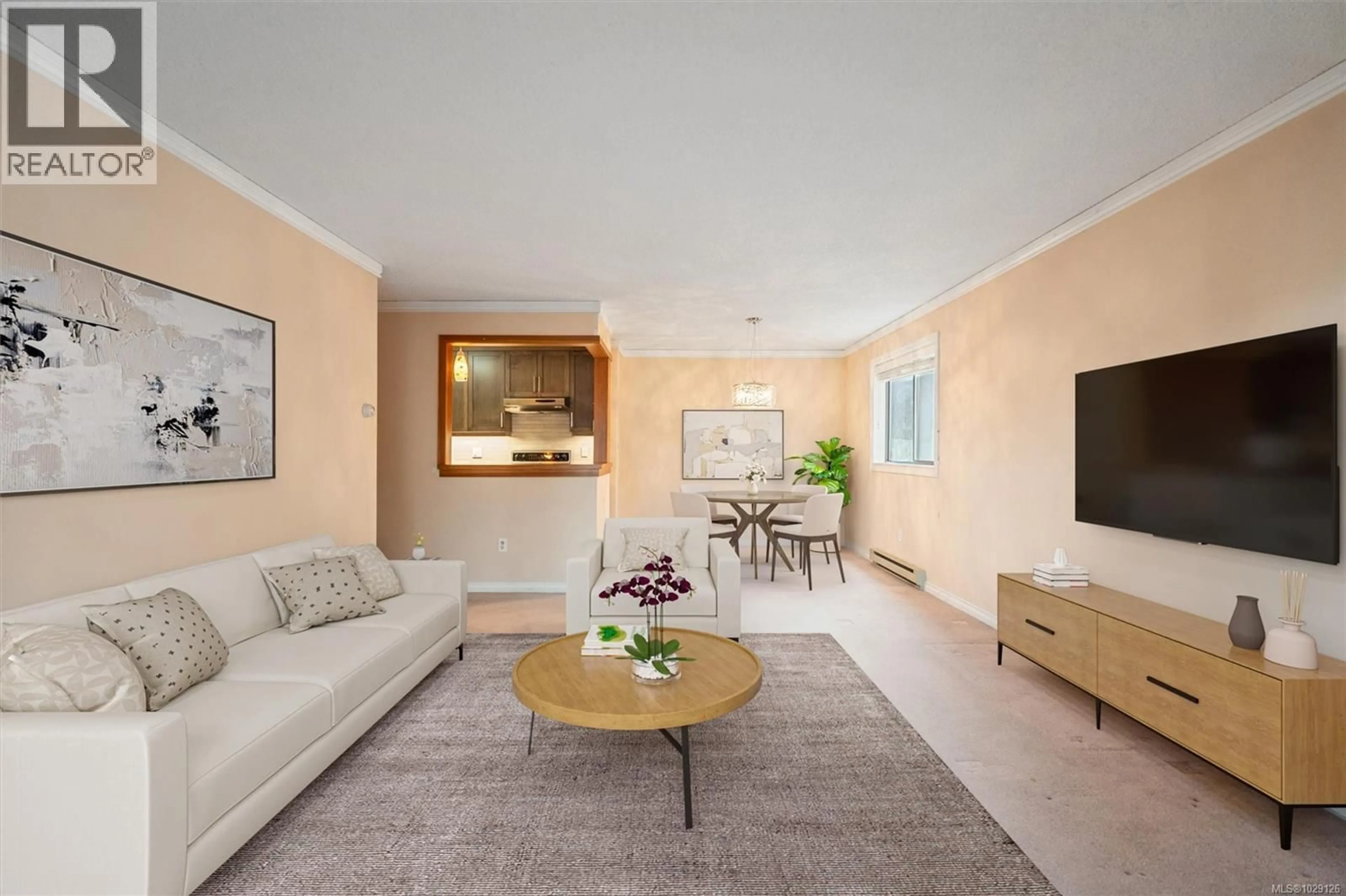 Living room with furniture, unknown for 202 - 3255 GLASGOW AVENUE, Saanich British Columbia V8X4S4