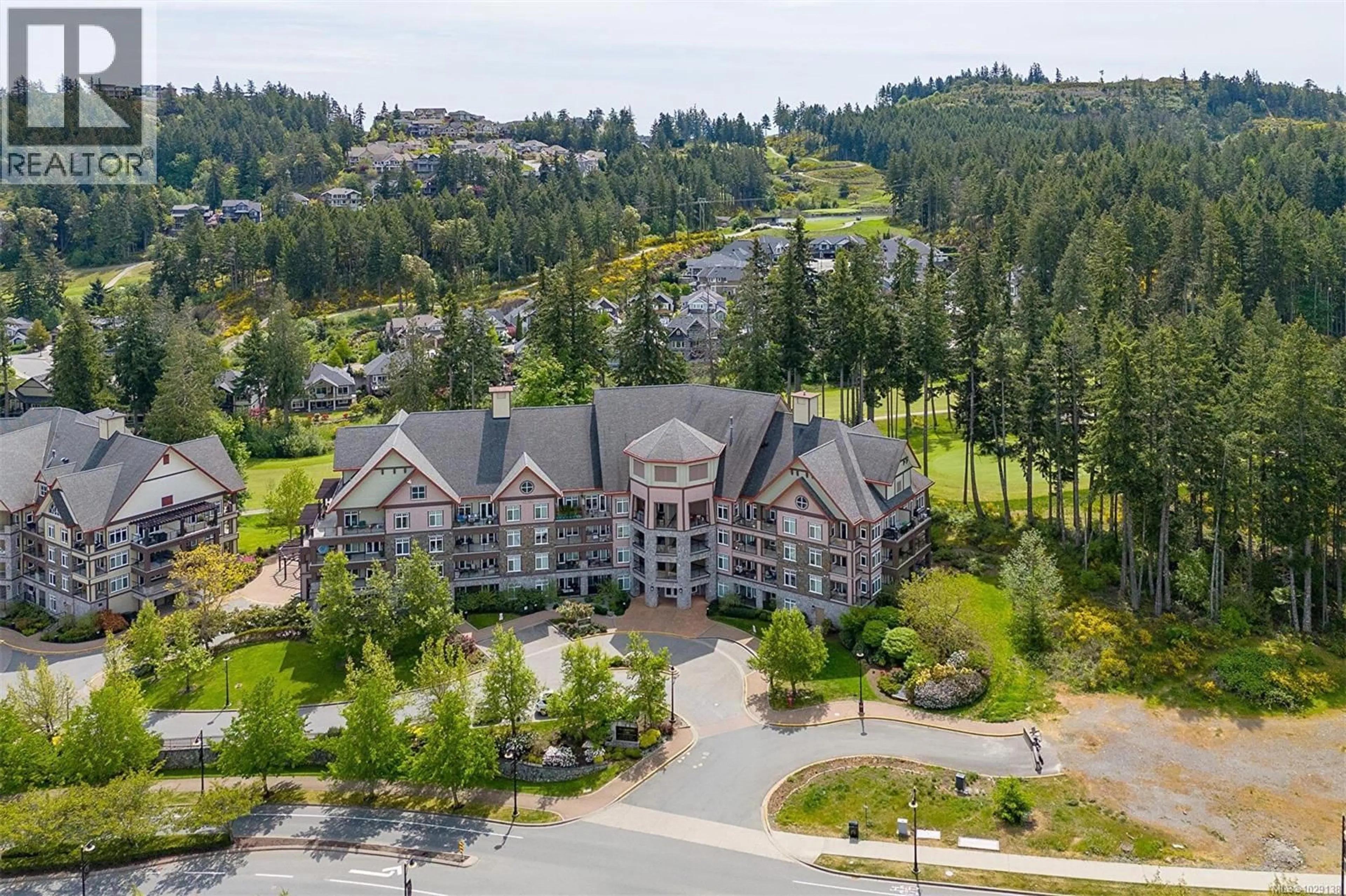 A pic from outside/outdoor area/front of a property/back of a property/a pic from drone, mountain view for 210/212 - 1395 BEAR MOUNTAIN PARKWAY, Langford British Columbia V9B0E1