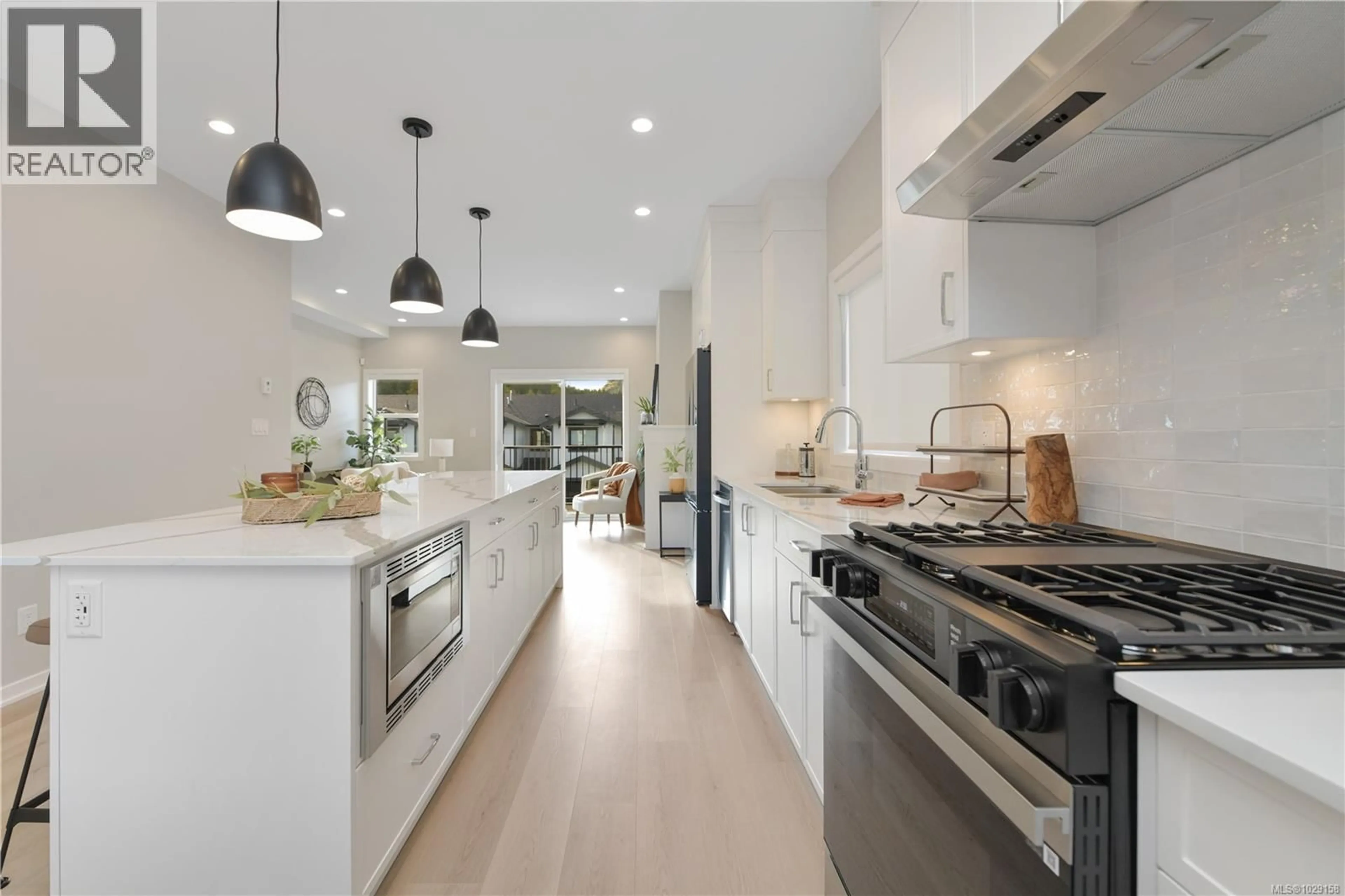 Open concept kitchen, ceramic/tile floor for 1511 ATLAS DRIVE, Langford British Columbia V9B7C4