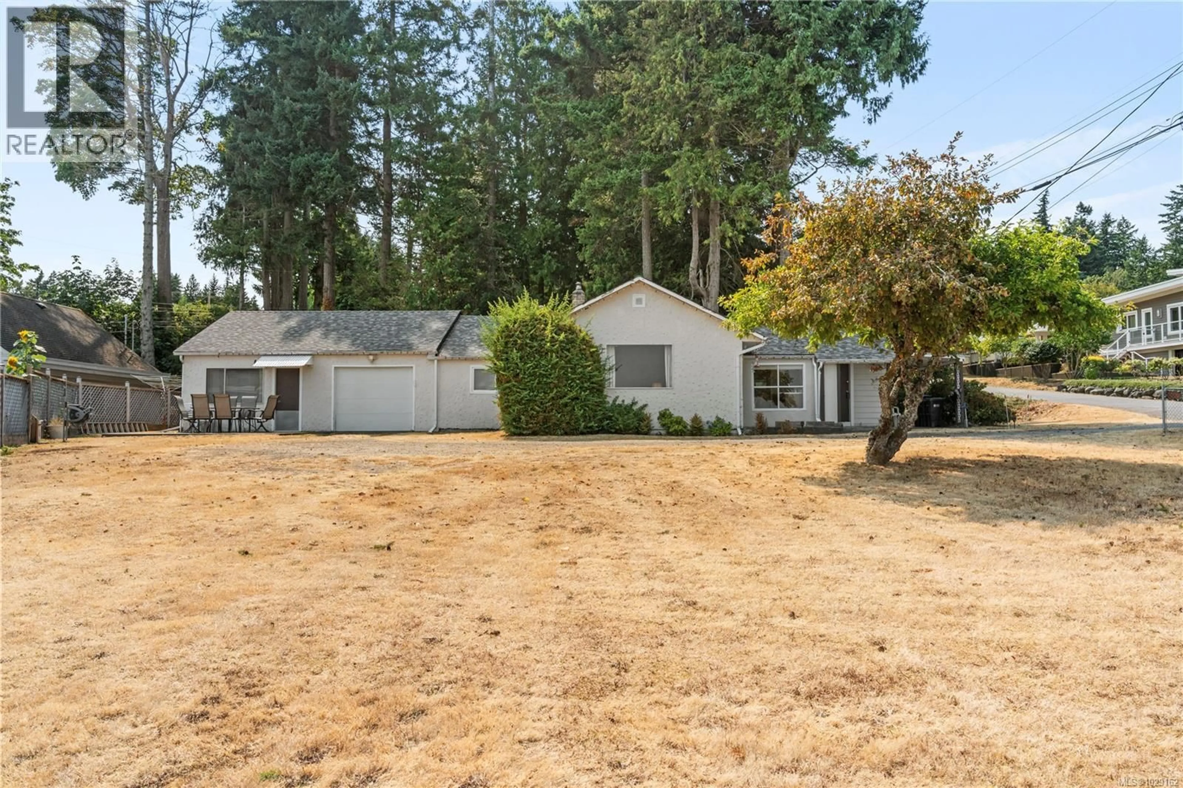 A pic from outside/outdoor area/front of a property/back of a property/a pic from drone, unknown for 35 BOWSER ROAD, Bowser British Columbia V0R1G0