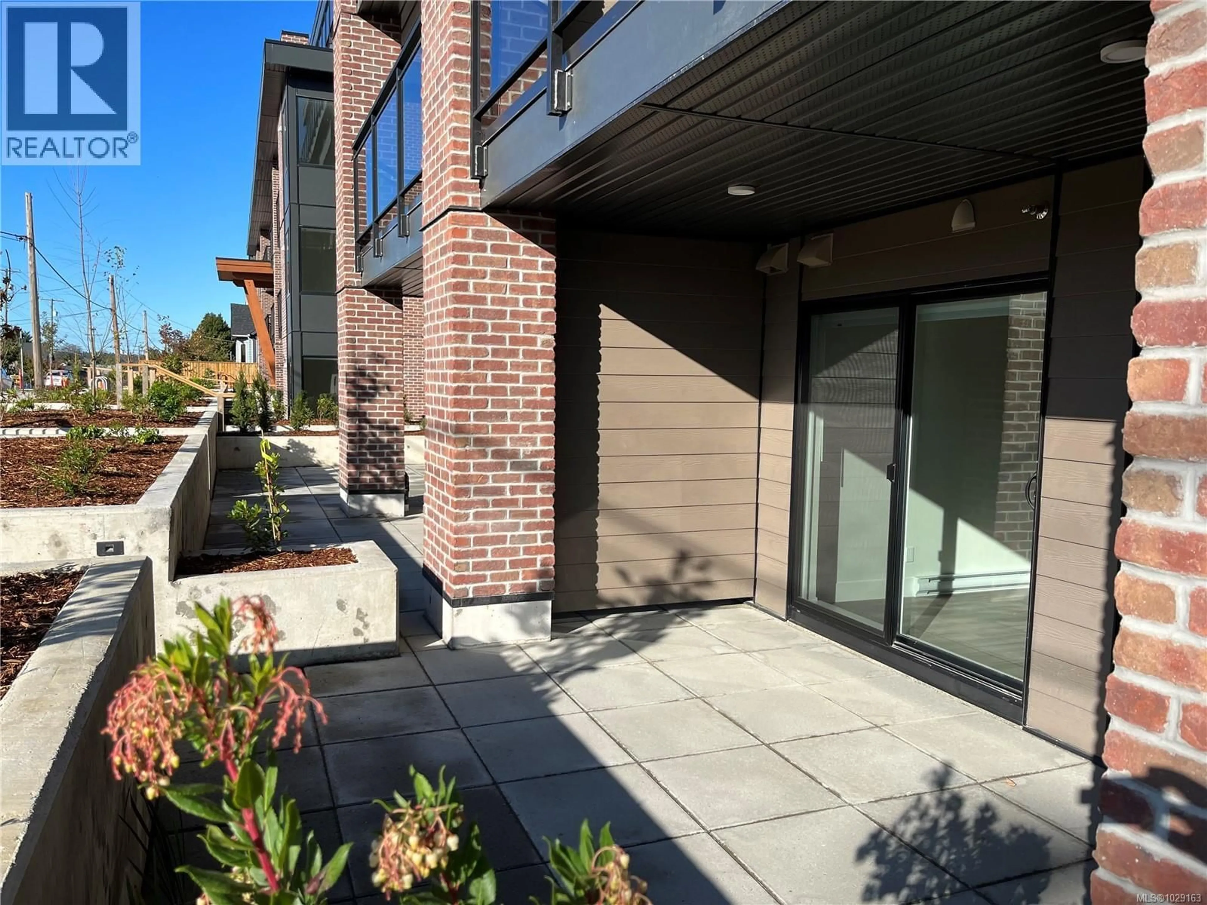 Home with brick exterior material, street for 103 - 147 HALIBURTON STREET, Nanaimo British Columbia V9R4V9