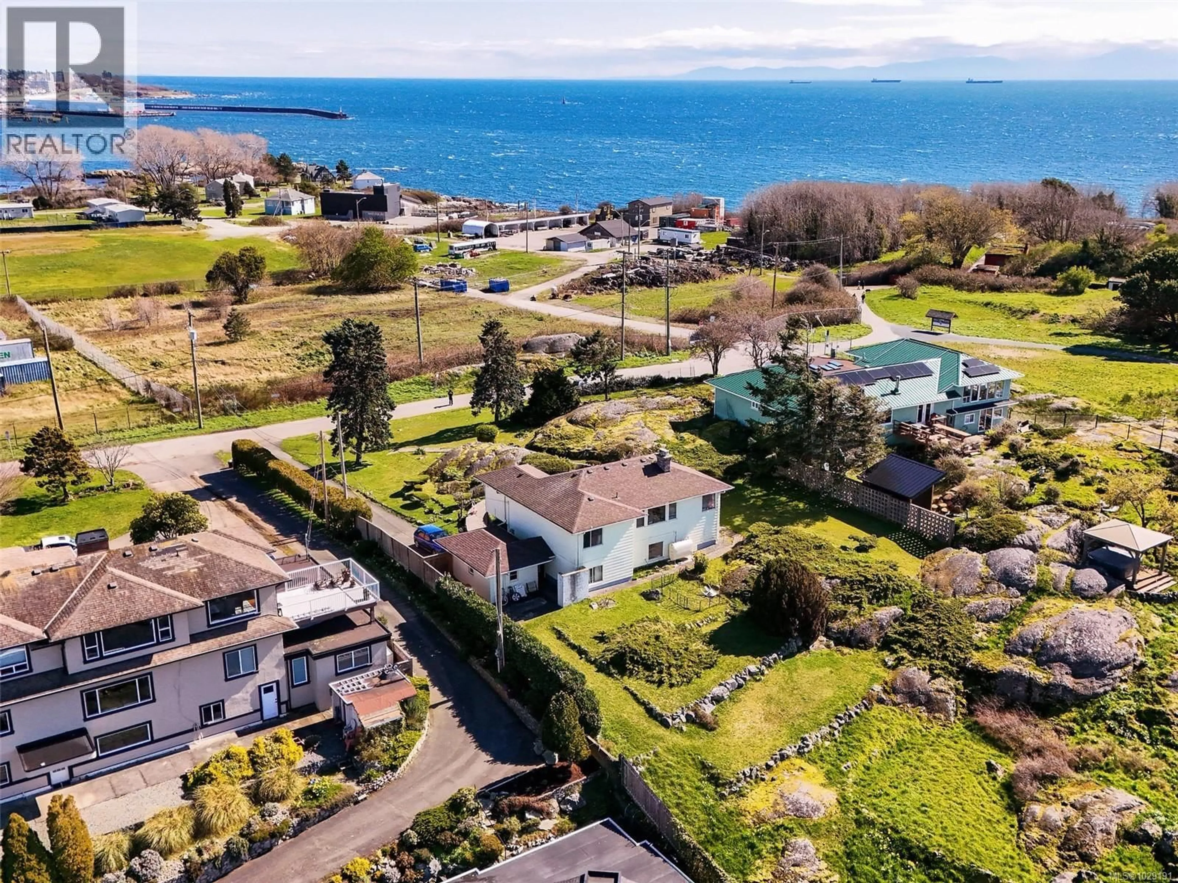 A pic from outside/outdoor area/front of a property/back of a property/a pic from drone, water/lake/river/ocean view for 310 CLIFTON TERRACE, Esquimalt British Columbia V9A5X9