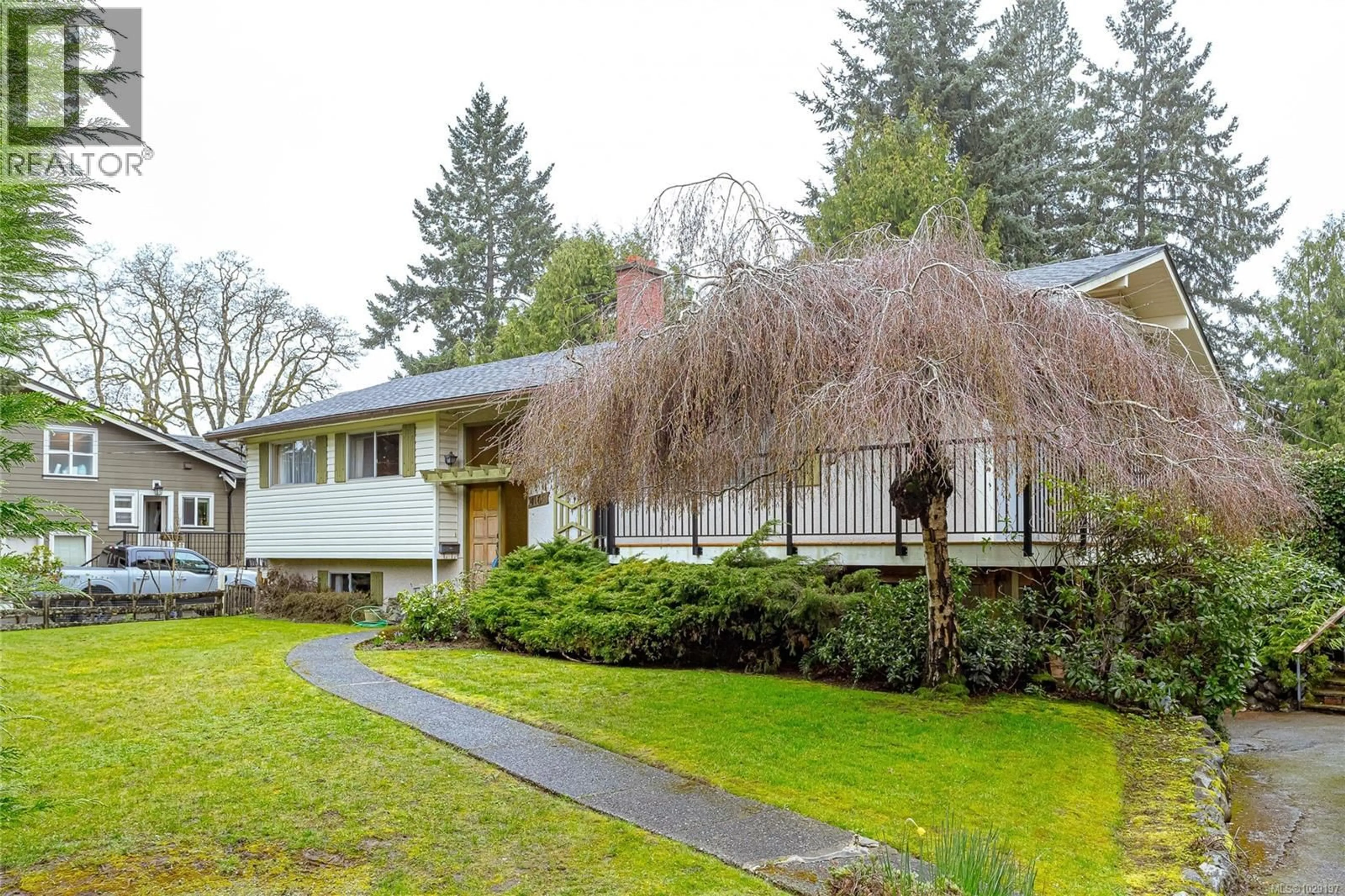 Home with vinyl exterior material, street for 4108 TORQUAY DRIVE, Saanich British Columbia V8N3K9