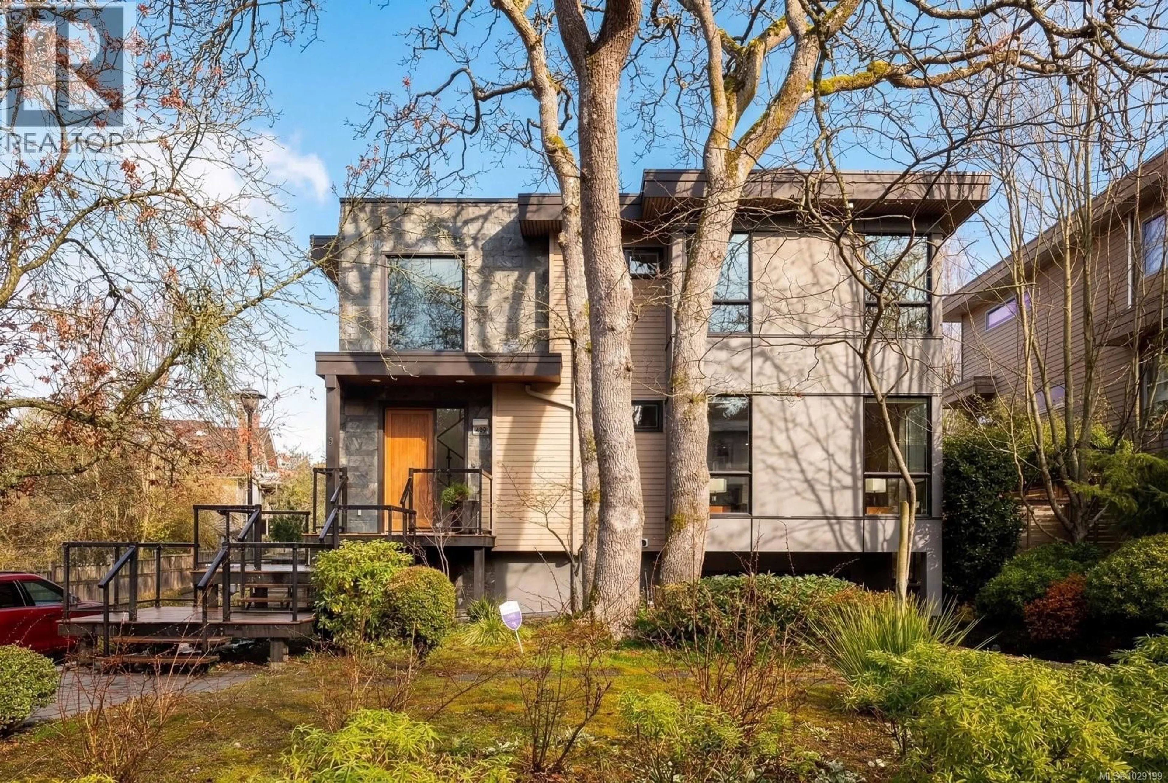 Home with brick exterior material, unknown for 409 CHADWICK PLACE, Victoria British Columbia V8S1H4