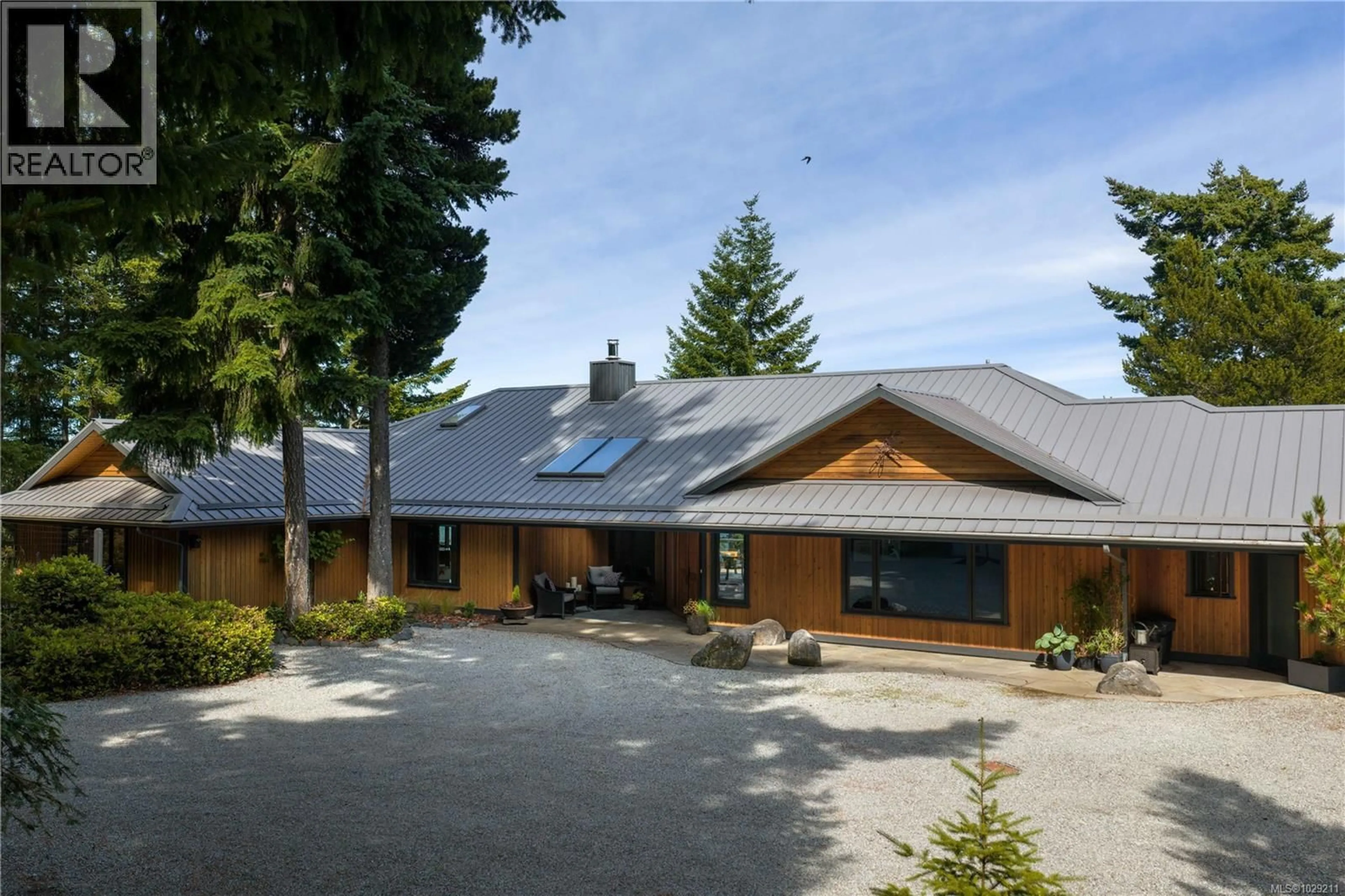 A pic from outside/outdoor area/front of a property/back of a property/a pic from drone, unknown for 253 CHILTON ROAD, Salt Spring British Columbia V8K2W9