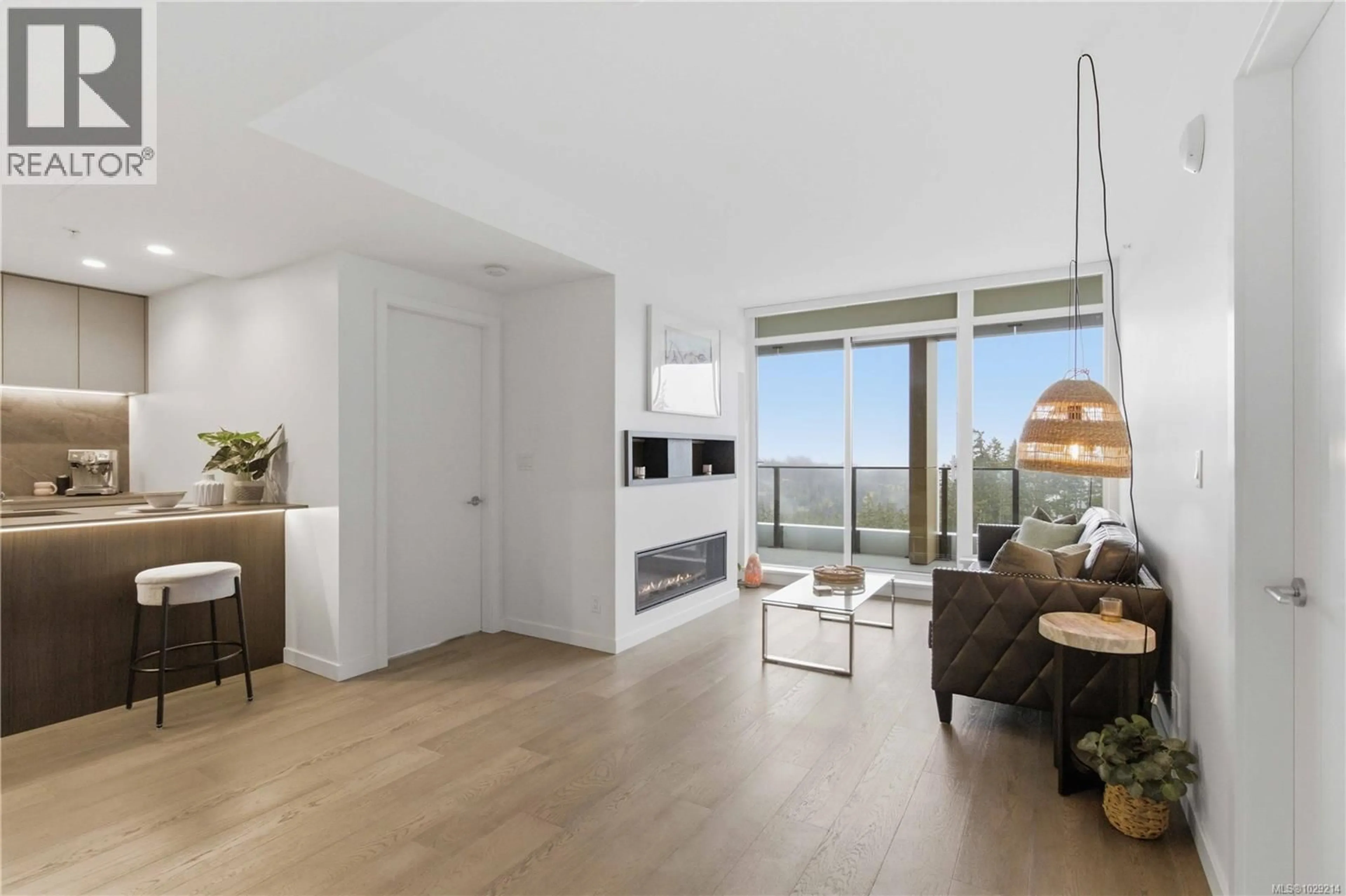 Living room with furniture, wood/laminate floor for 1006 - 2000 HANNINGTON ROAD, Langford British Columbia V9B6R6