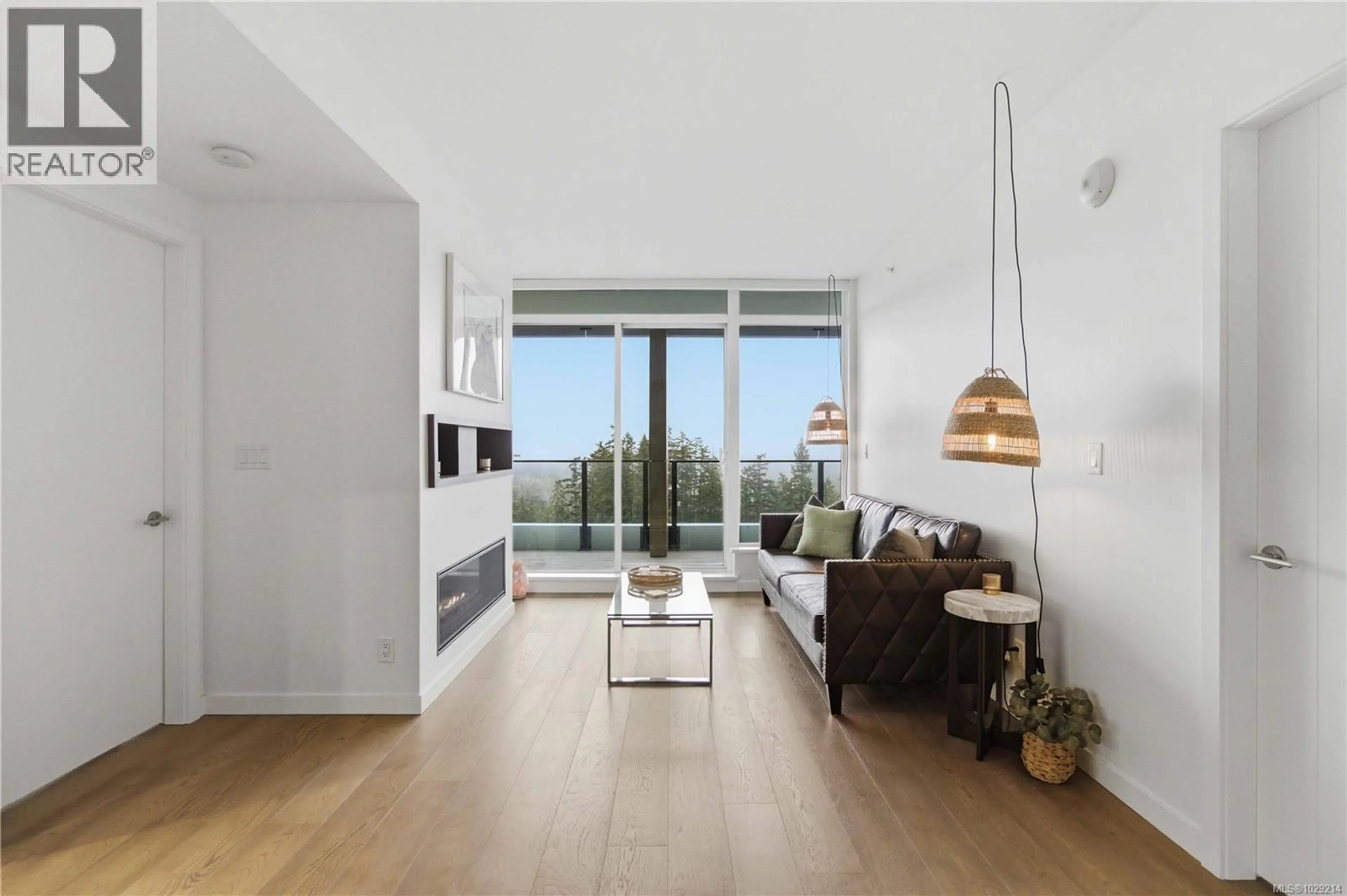 Living room with furniture, wood/laminate floor for 1006 - 2000 HANNINGTON ROAD, Langford British Columbia V9B6R6