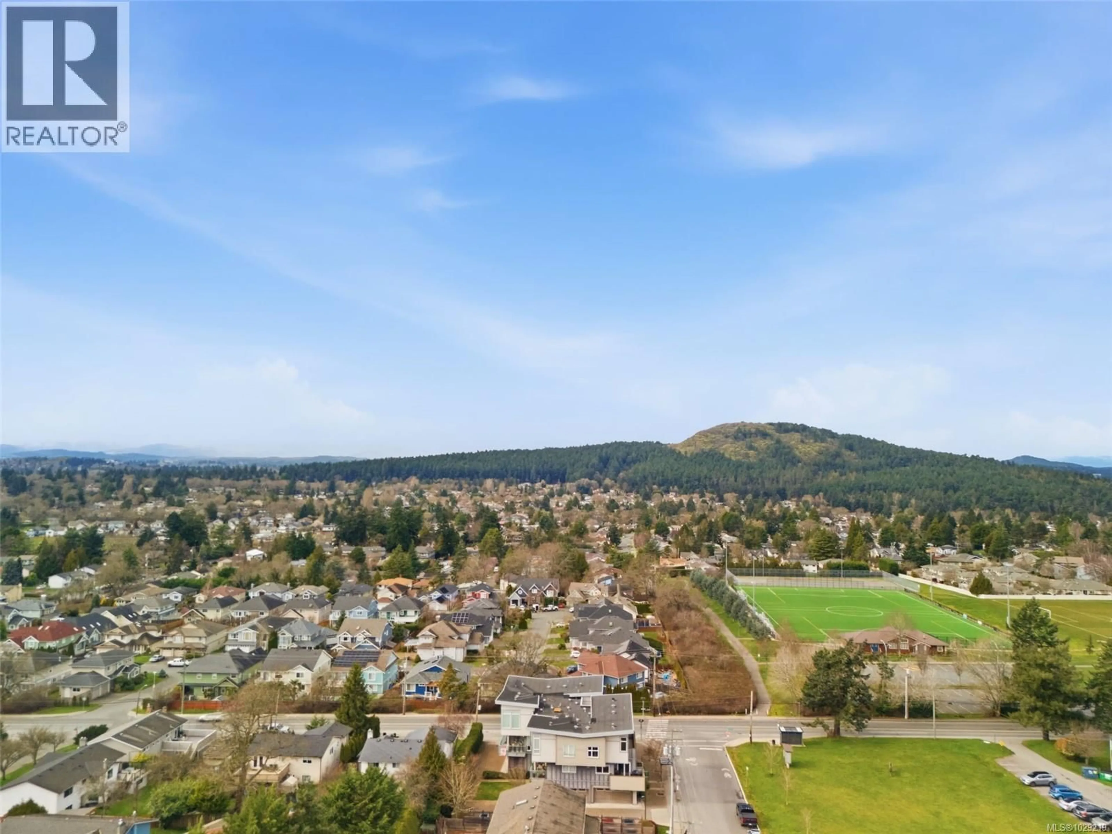 A pic from outside/outdoor area/front of a property/back of a property/a pic from drone, mountain view for 104 - 4343 TYNDALL AVENUE, Saanich British Columbia V8N3R9