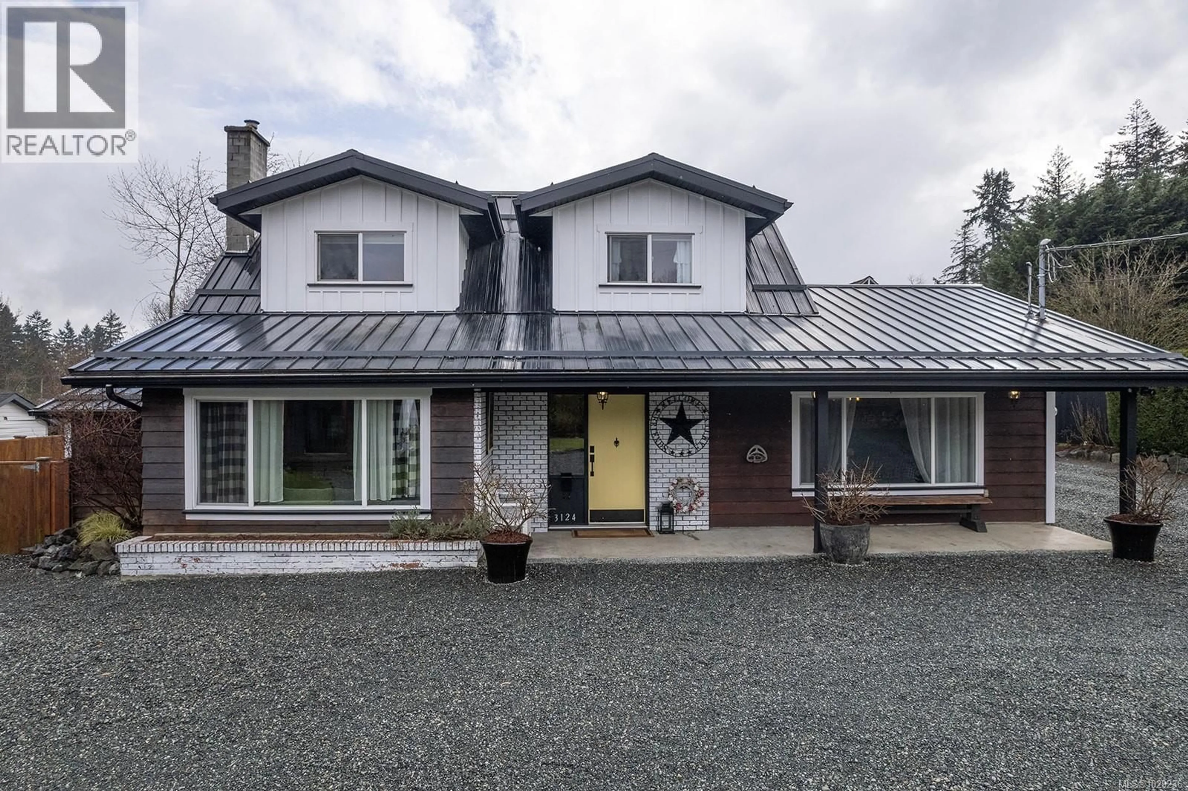 A pic from outside/outdoor area/front of a property/back of a property/a pic from drone, street for 3124 DRINKWATER ROAD, Duncan British Columbia V9L5Z1
