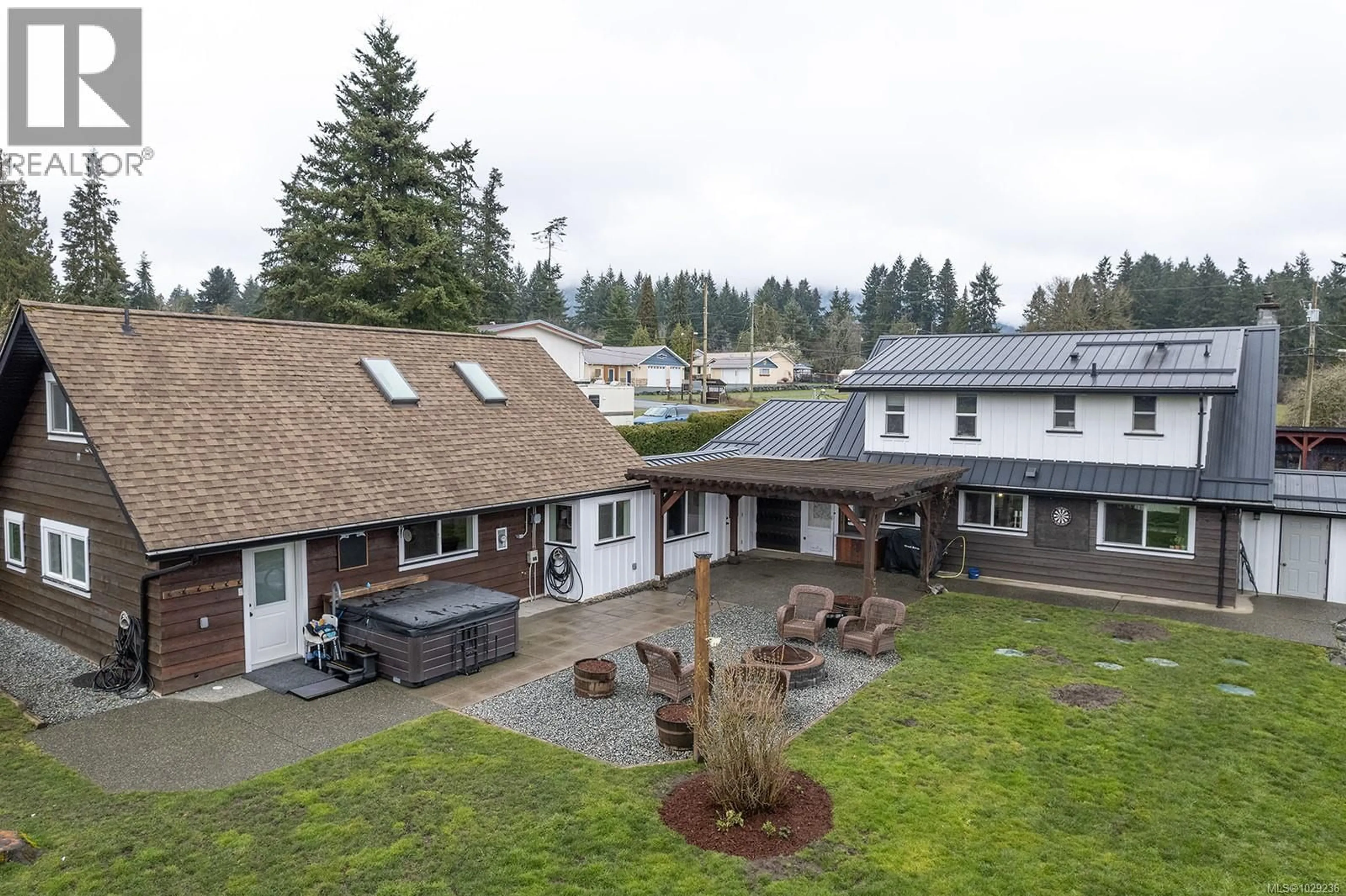 A pic from outside/outdoor area/front of a property/back of a property/a pic from drone, mountain view for 3124 DRINKWATER ROAD, Duncan British Columbia V9L5Z1