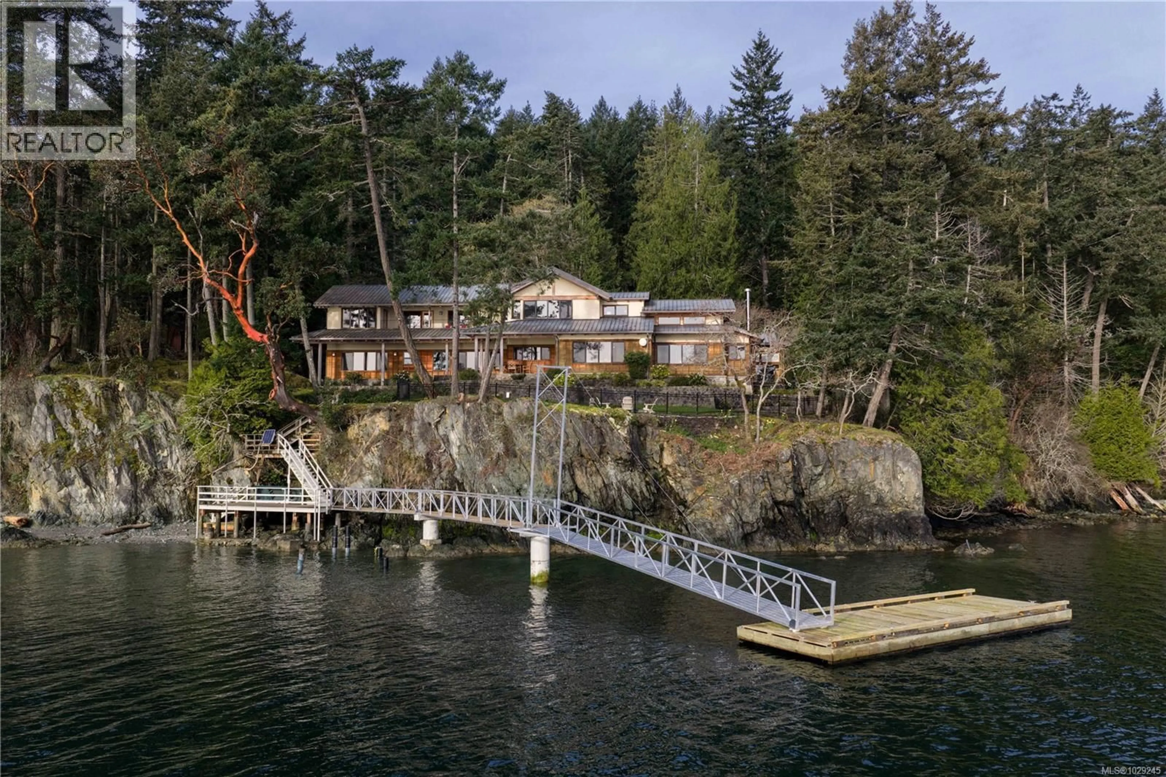 A pic from outside/outdoor area/front of a property/back of a property/a pic from drone, water/lake/river/ocean view for 250 HOLMES ROAD, Salt Spring British Columbia V8K1T6