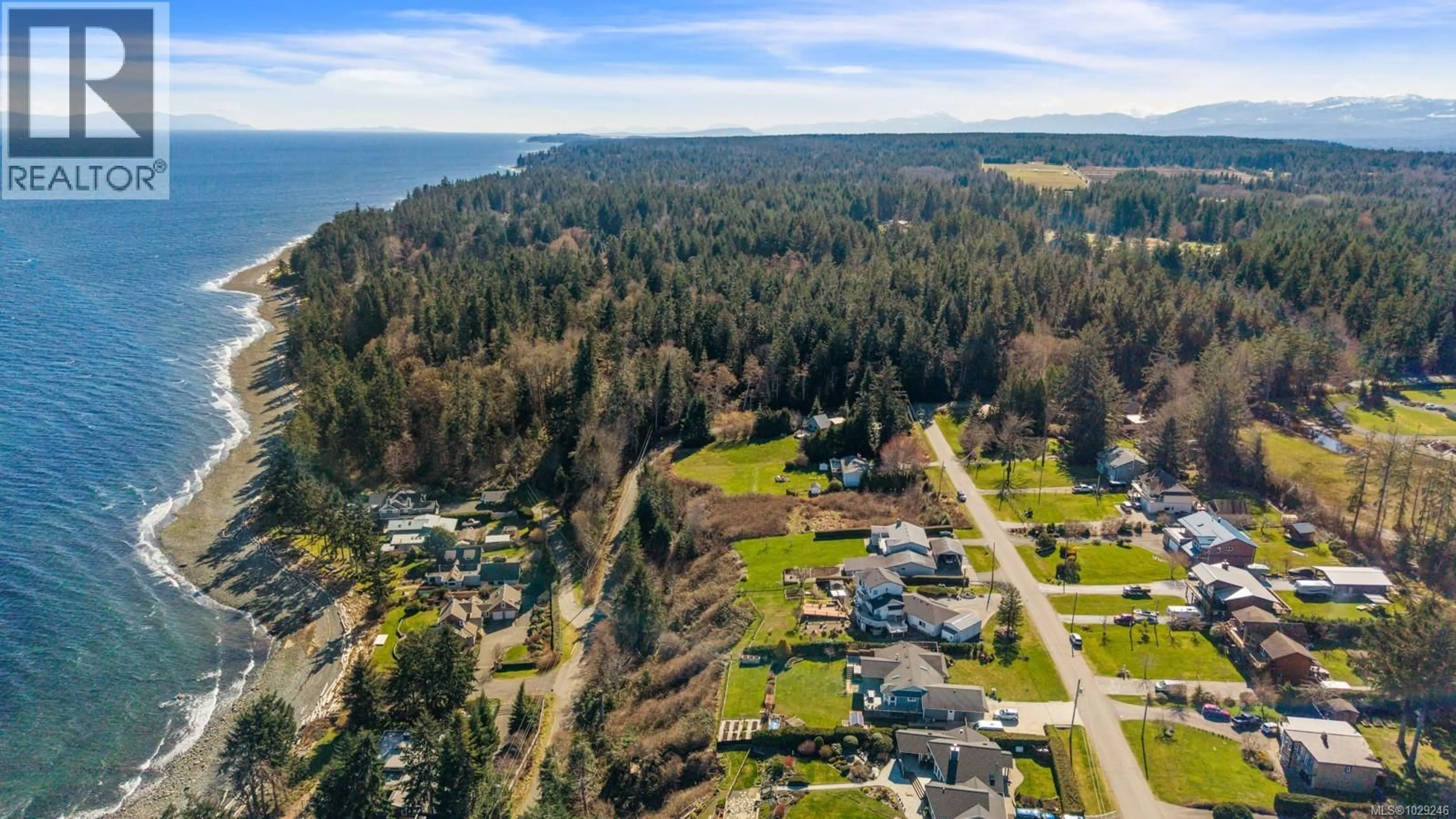 A pic from outside/outdoor area/front of a property/back of a property/a pic from drone, water/lake/river/ocean view for 6349 EAGLES DRIVE, Courtenay British Columbia V9J1V4