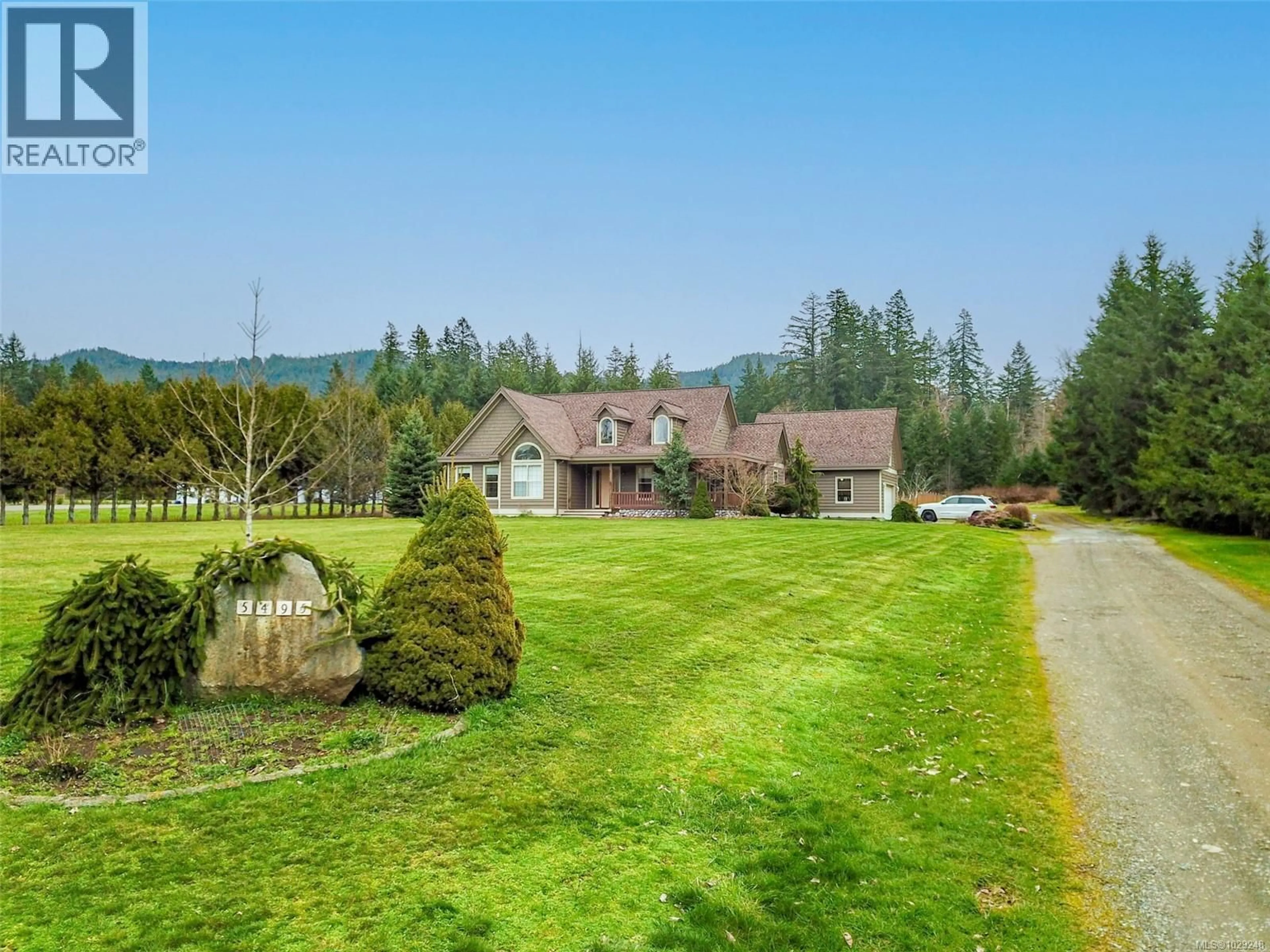 A pic from outside/outdoor area/front of a property/back of a property/a pic from drone, mountain view for 5495 MAEBELLE ROAD, Port Alberni British Columbia V9Y8R2