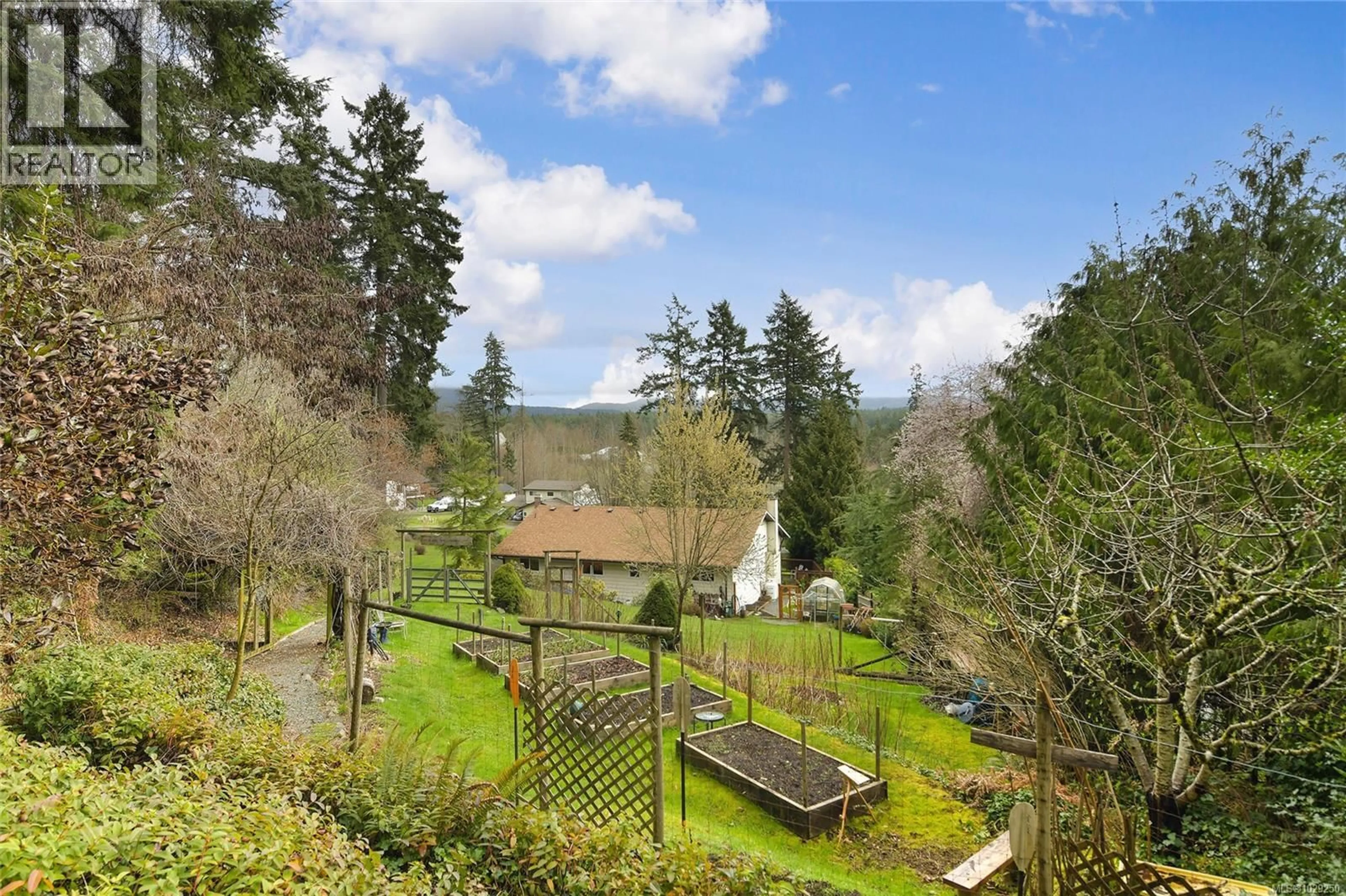 A pic from outside/outdoor area/front of a property/back of a property/a pic from drone, forest/trees view for 6670 ANZIO ROAD, Duncan British Columbia V9L6C4