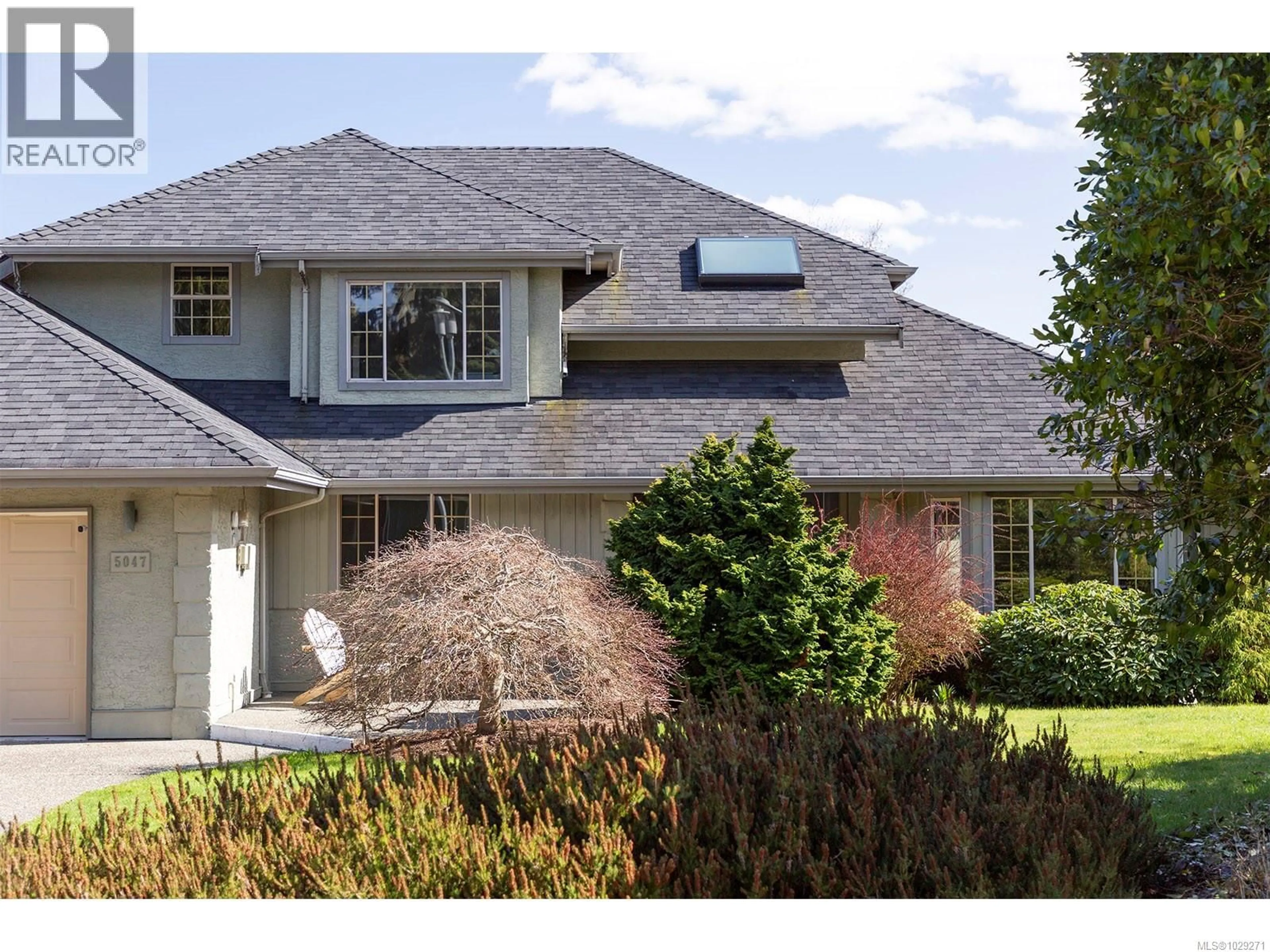 Home with brick exterior material, street for 5047 BENTON COURT, Saanich British Columbia V8Y2Z5