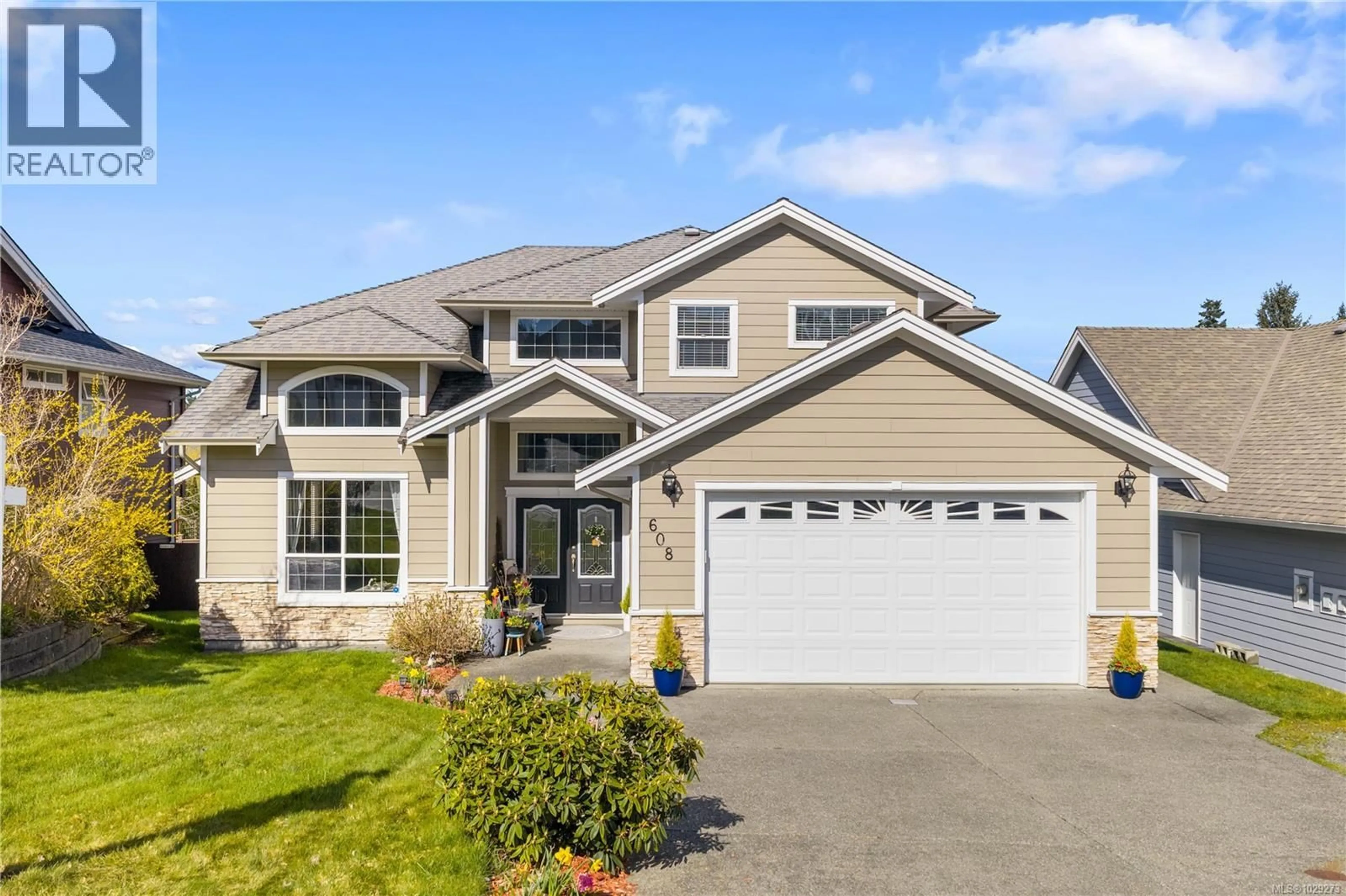 Home with vinyl exterior material, street for 608 NELSON ROAD, Campbell River British Columbia V9H1V1