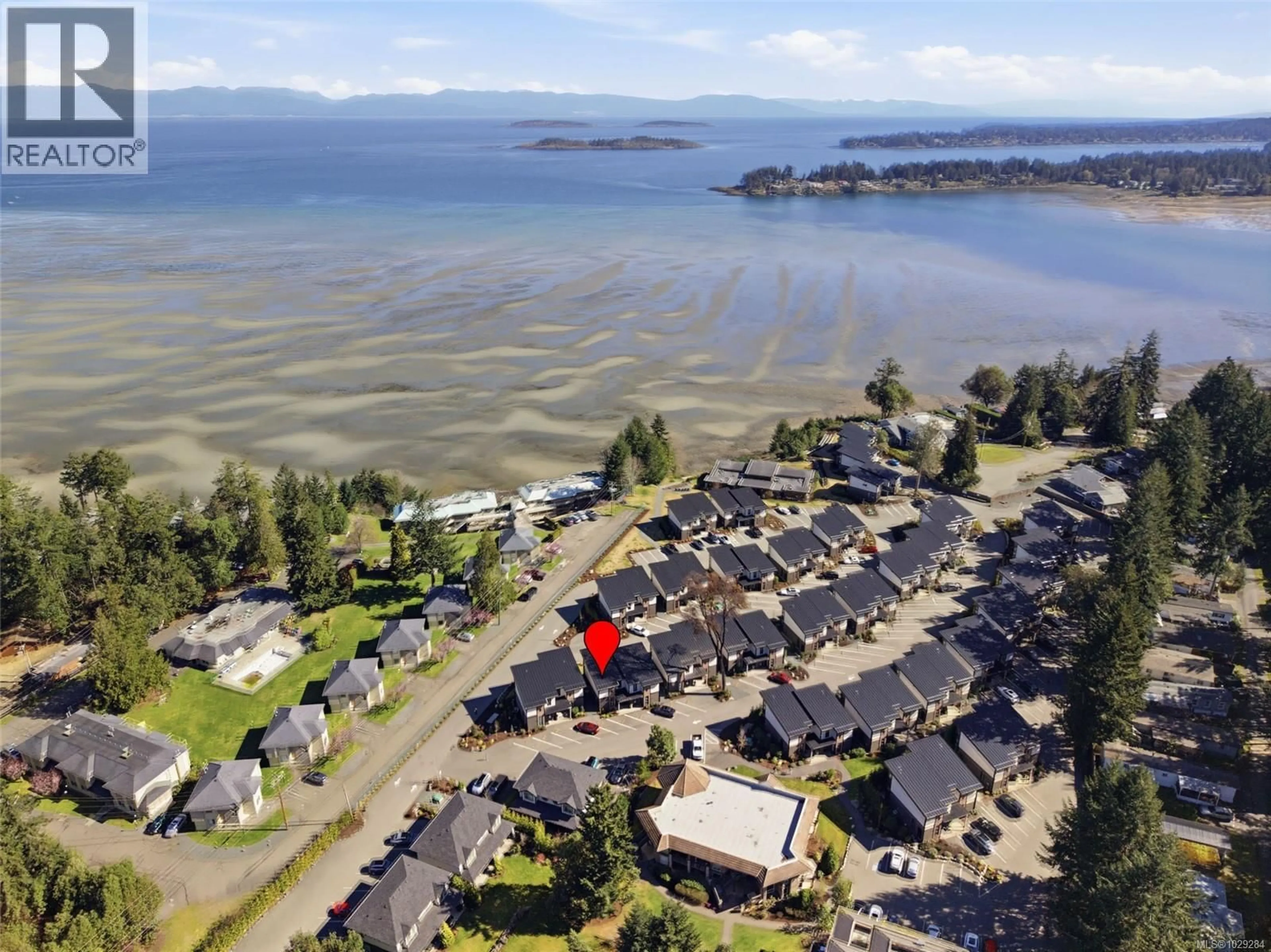 A pic from outside/outdoor area/front of a property/back of a property/a pic from drone, water/lake/river/ocean view for 9 - 1175 RESORT DRIVE, Parksville British Columbia V9P2E3