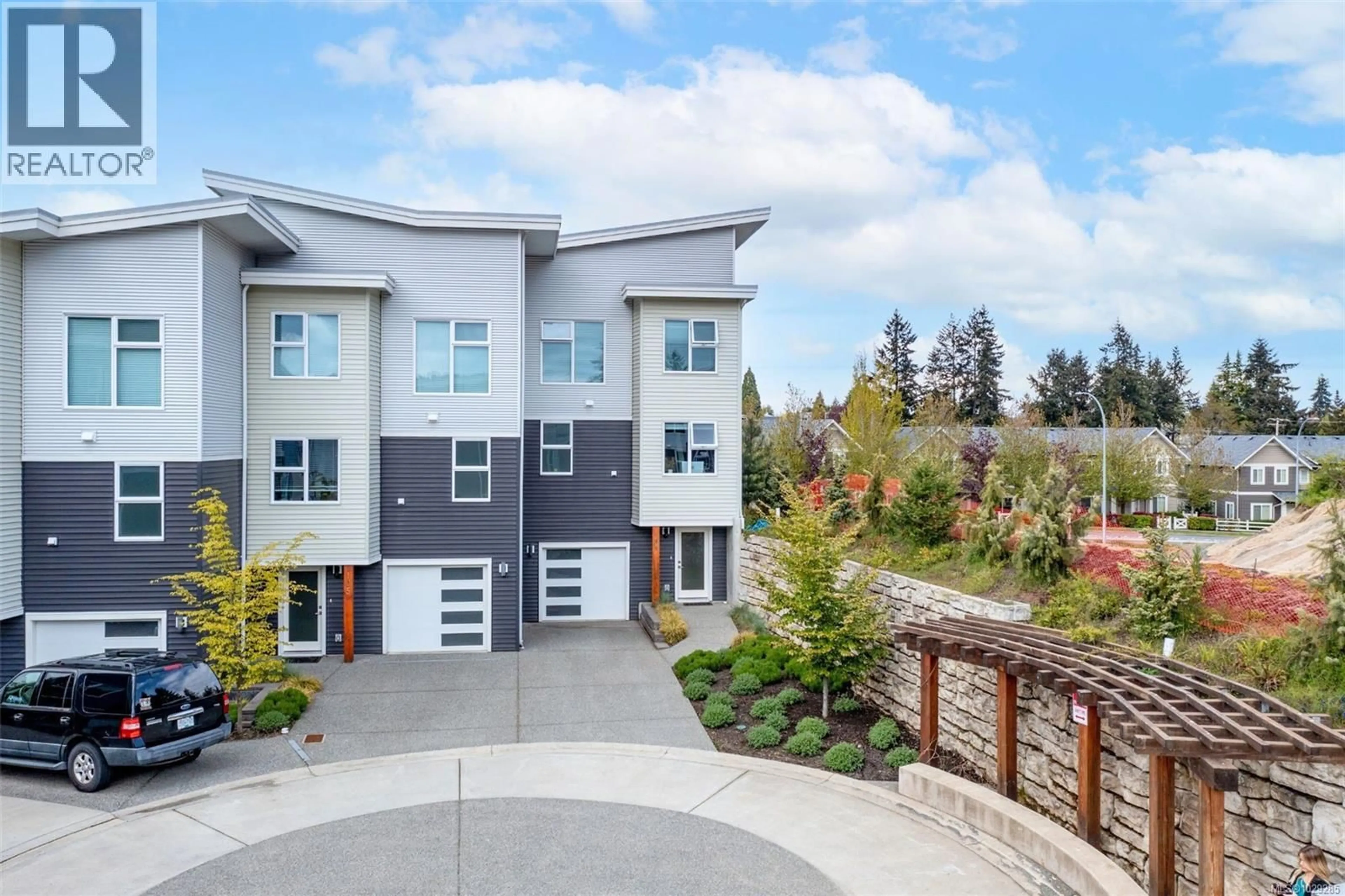 A pic from outside/outdoor area/front of a property/back of a property/a pic from drone, street for 106 - 1800 SUMMERHILL PLACE, Nanaimo British Columbia V9S0C7