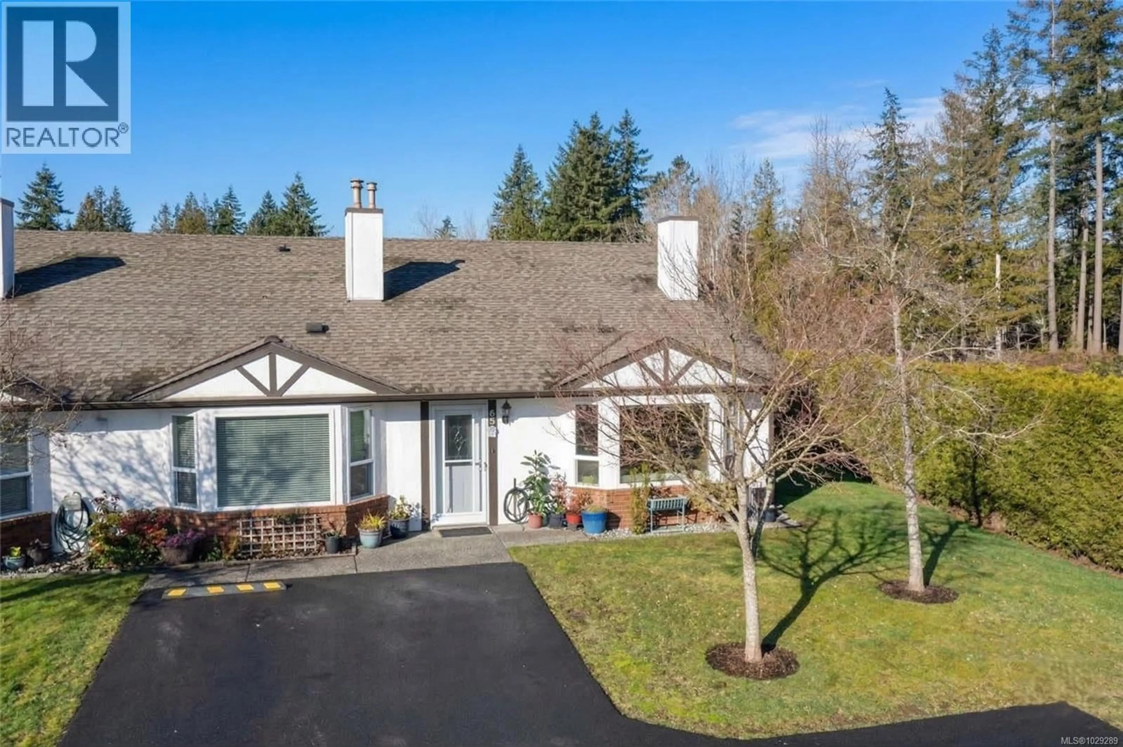 A pic from outside/outdoor area/front of a property/back of a property/a pic from drone, street for 65 - 120 FINHOLM STREET, Parksville British Columbia V9P1J6