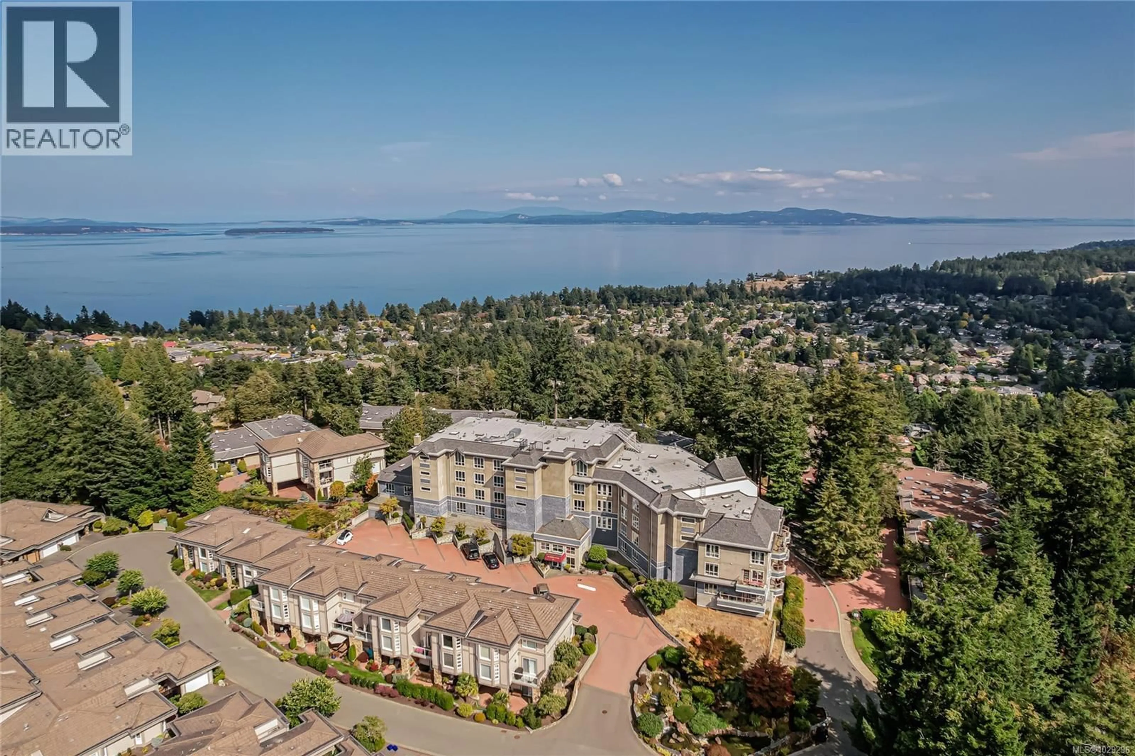 A pic from outside/outdoor area/front of a property/back of a property/a pic from drone, water/lake/river/ocean view for 201 - 940 BOULDERWOOD RISE, Saanich British Columbia V8Y3H5