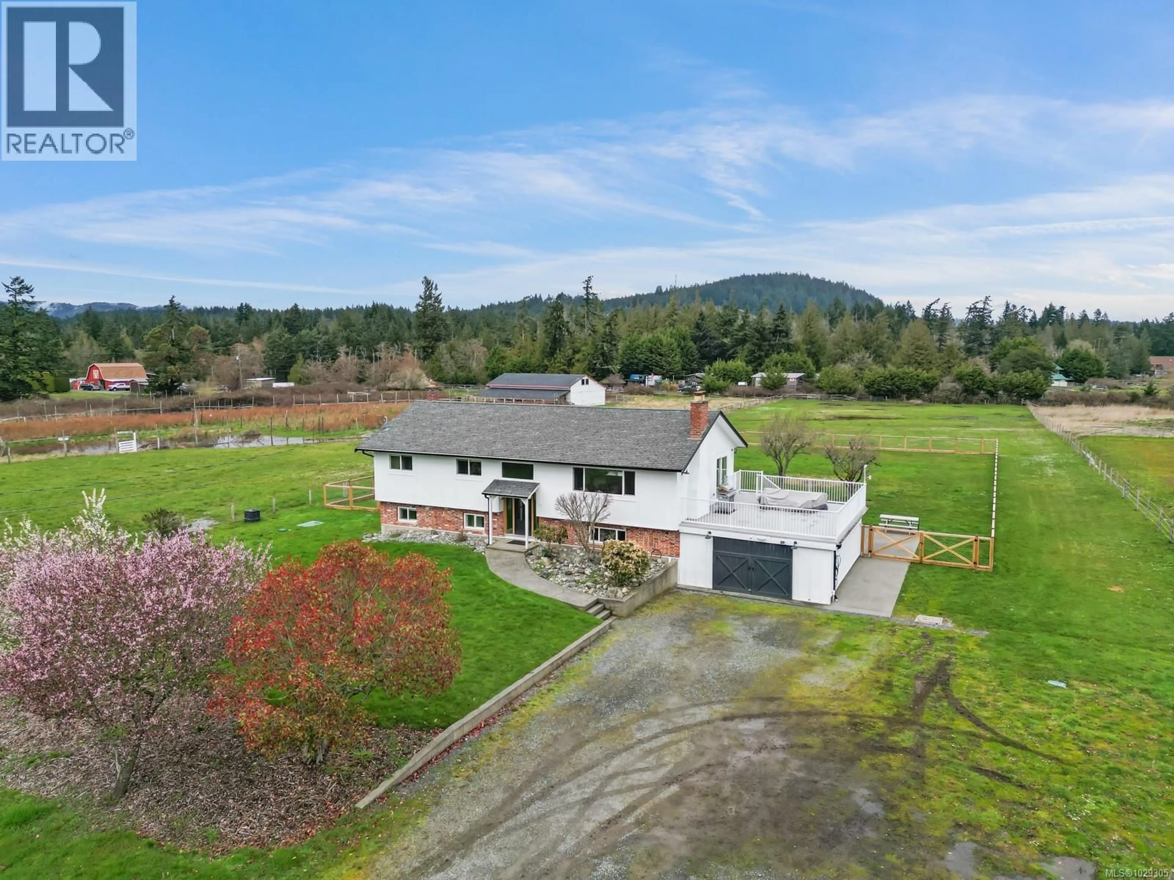 A pic from outside/outdoor area/front of a property/back of a property/a pic from drone, mountain view for 4425 HAPPY VALLEY ROAD, Metchosin British Columbia V9C3Z3