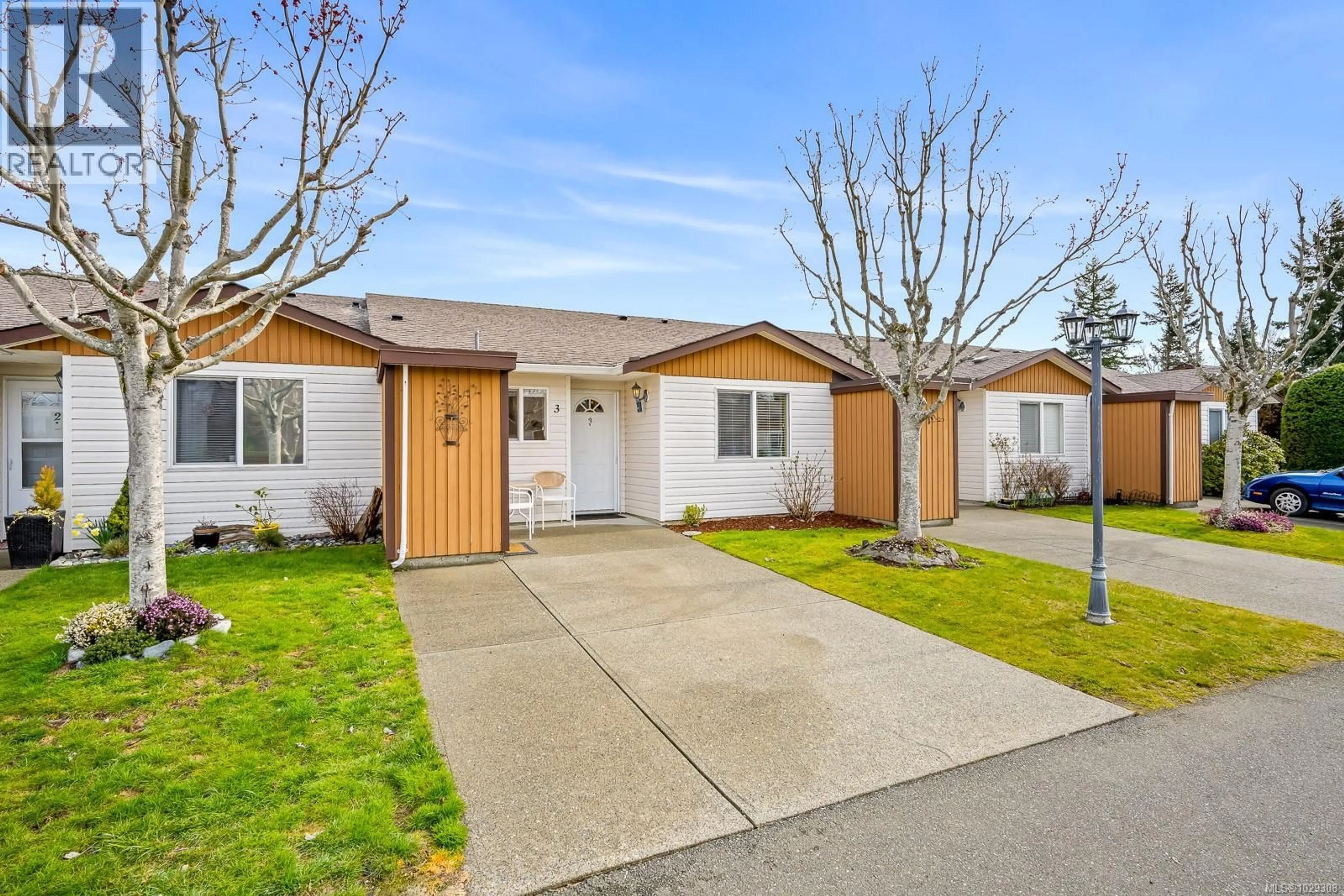 Home with vinyl exterior material, street for 3 - 2197 MURRELET DRIVE, Comox British Columbia V9M3Y1