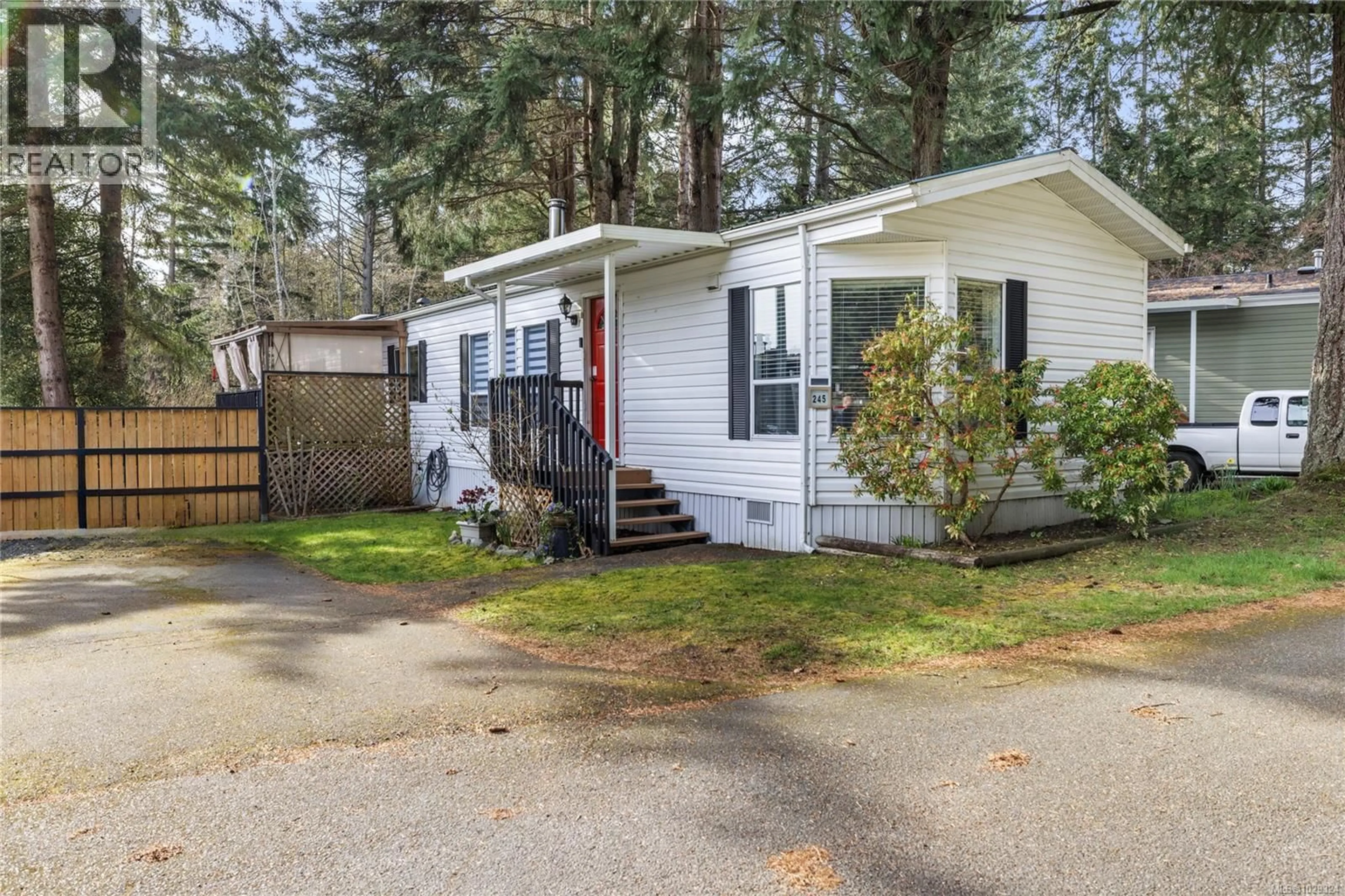 Home with vinyl exterior material, street for 245 - 2465 APOLLO DRIVE, Nanoose Bay British Columbia V9P9K2