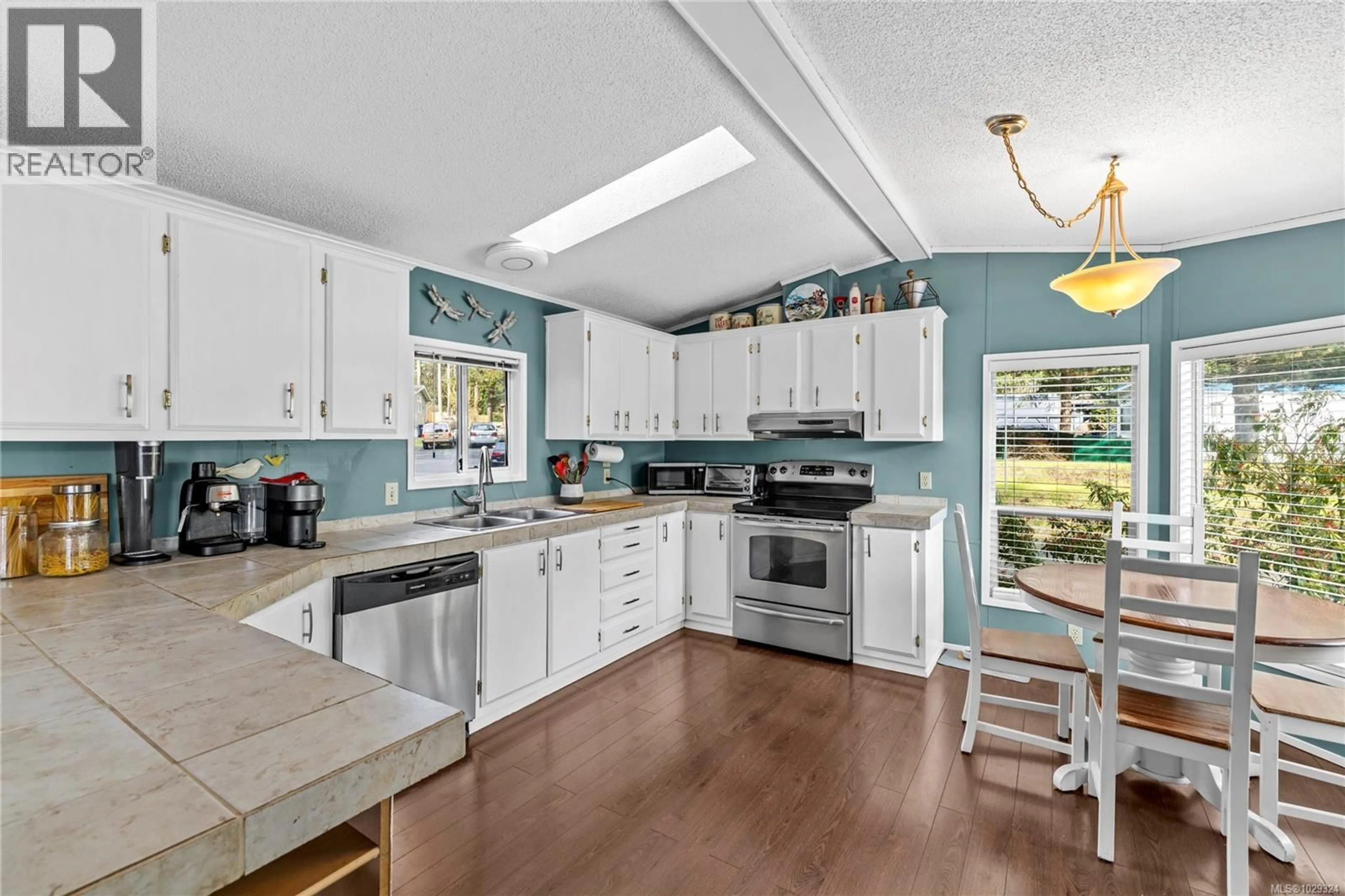 Open concept kitchen, ceramic/tile floor for 245 - 2465 APOLLO DRIVE, Nanoose Bay British Columbia V9P9K2