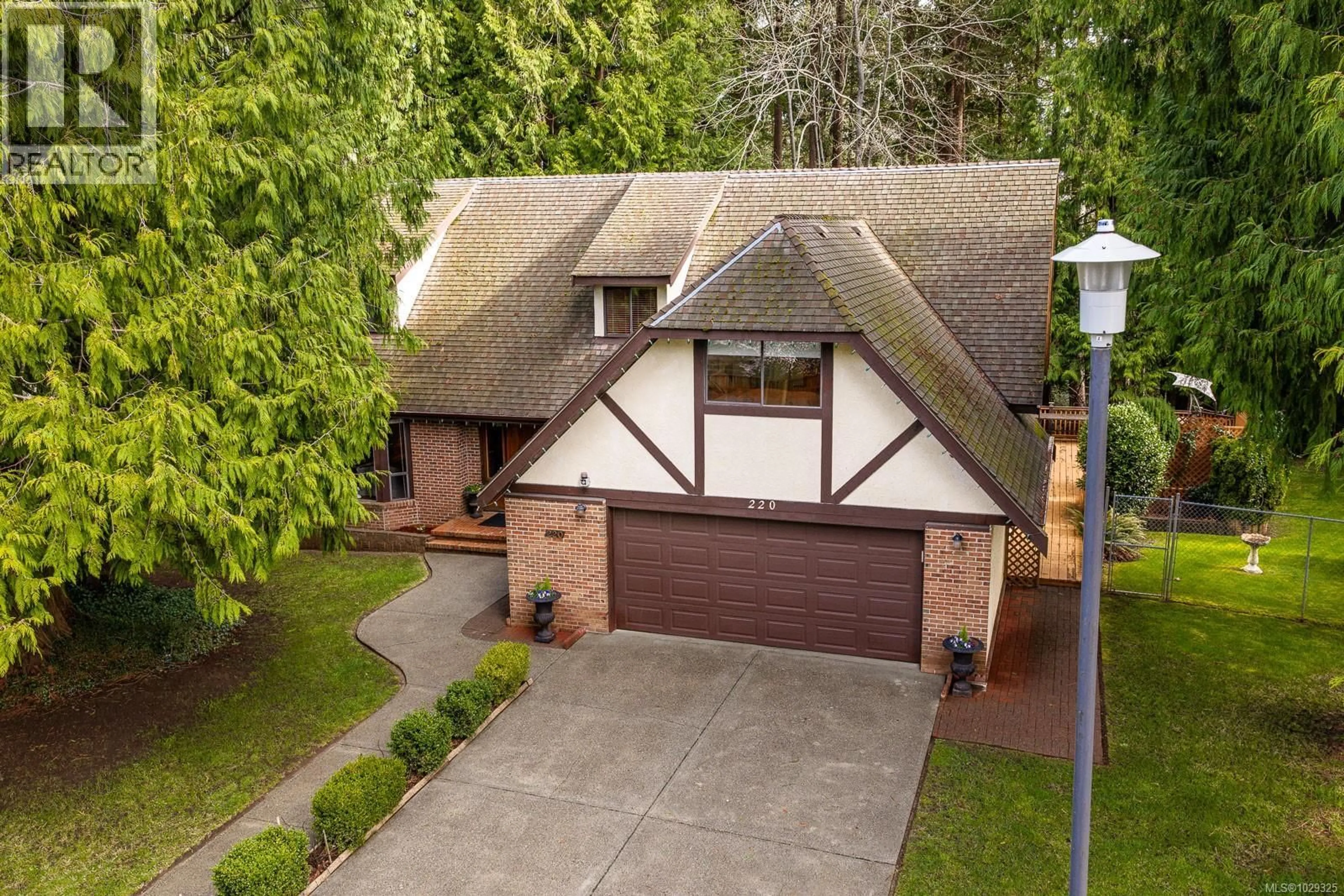 A pic from outside/outdoor area/front of a property/back of a property/a pic from drone, street for 220 MARIDA PLACE, Comox British Columbia V9M2P7