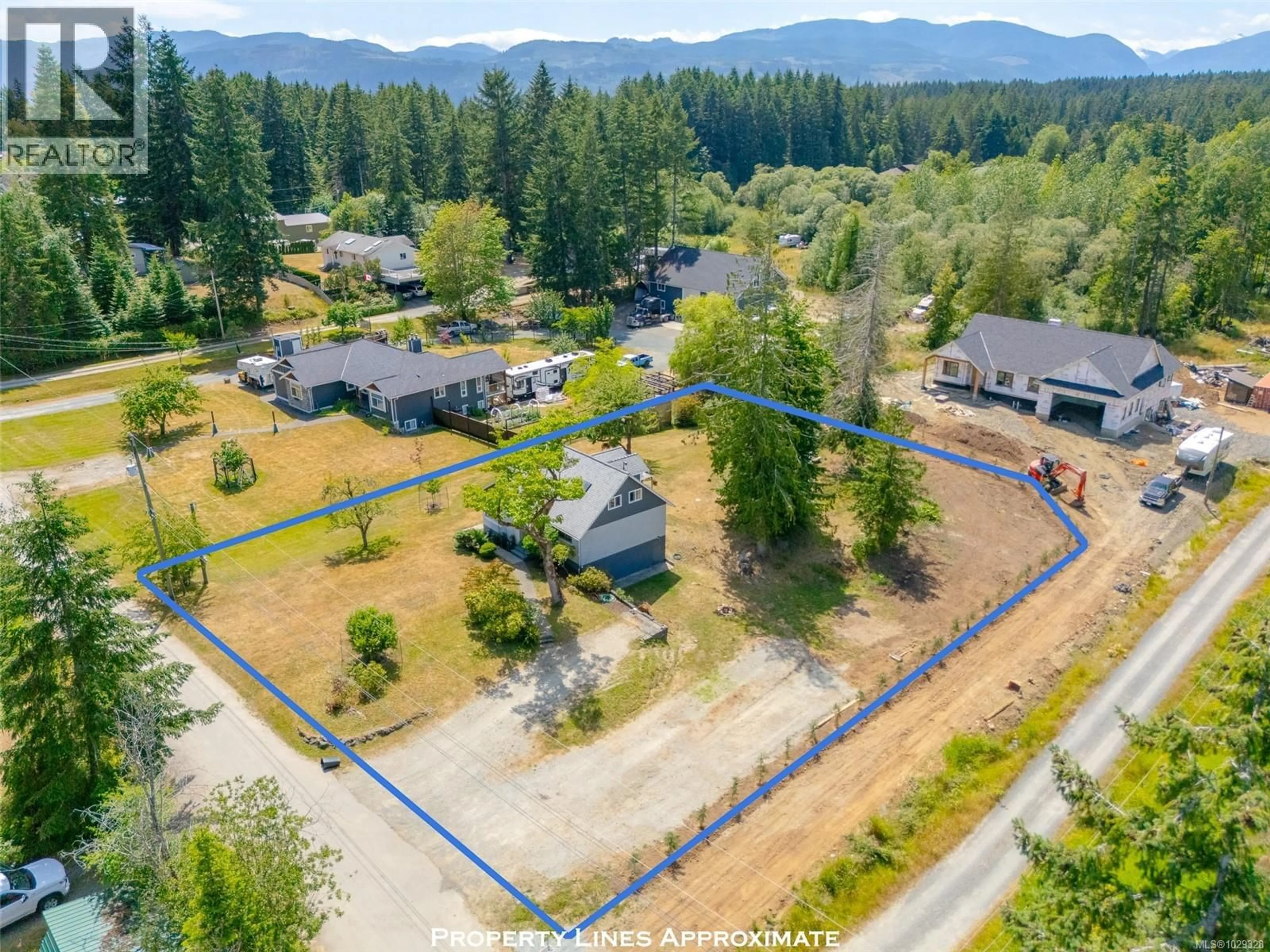 A pic from outside/outdoor area/front of a property/back of a property/a pic from drone, mountain view for 6088 RENTON ROAD SOUTH, Port Alberni British Columbia V9Y8R8