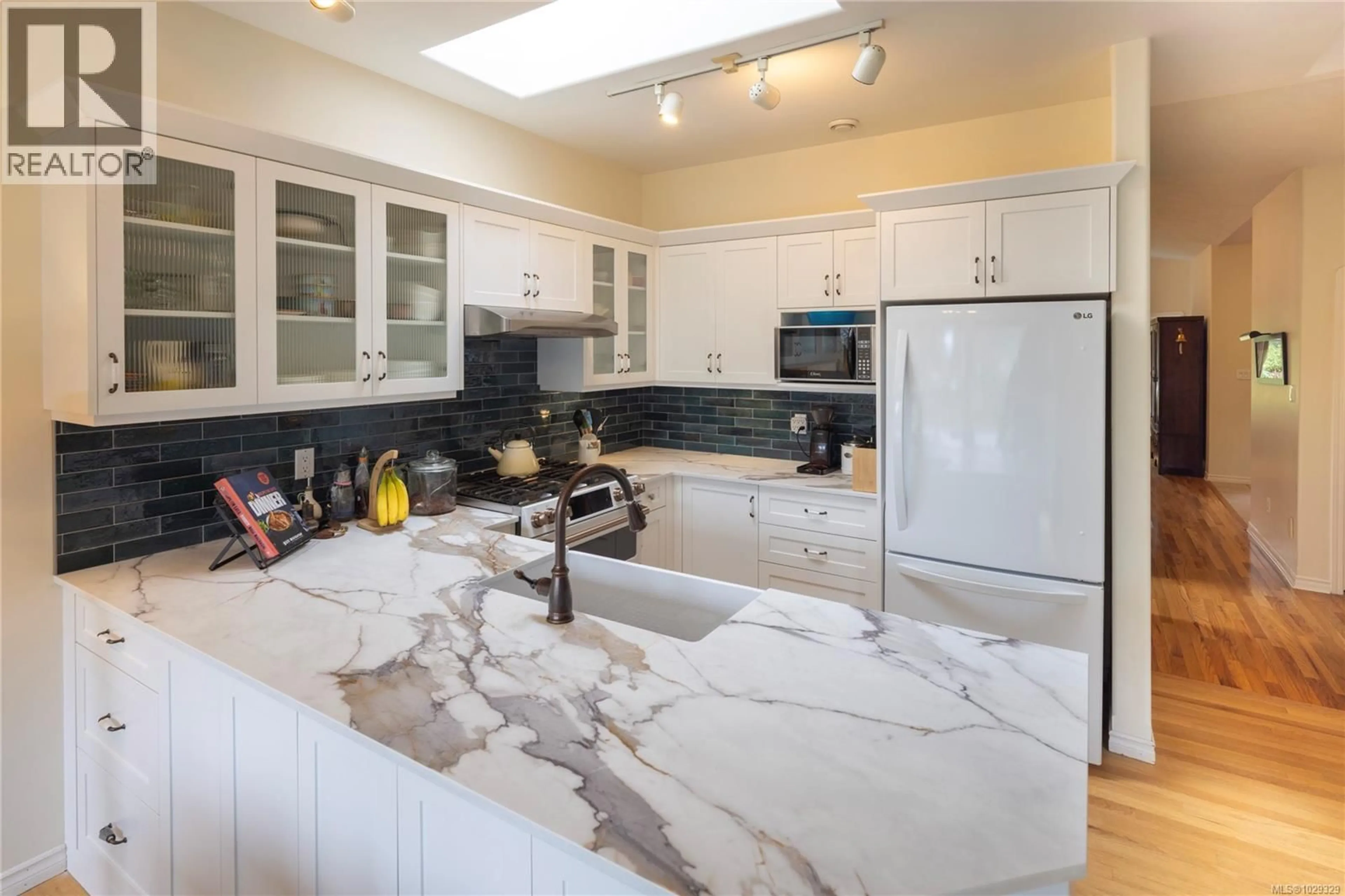 Contemporary kitchen, ceramic/tile floor for 1058 HOLLY PARK ROAD, Central Saanich British Columbia V8M1H8