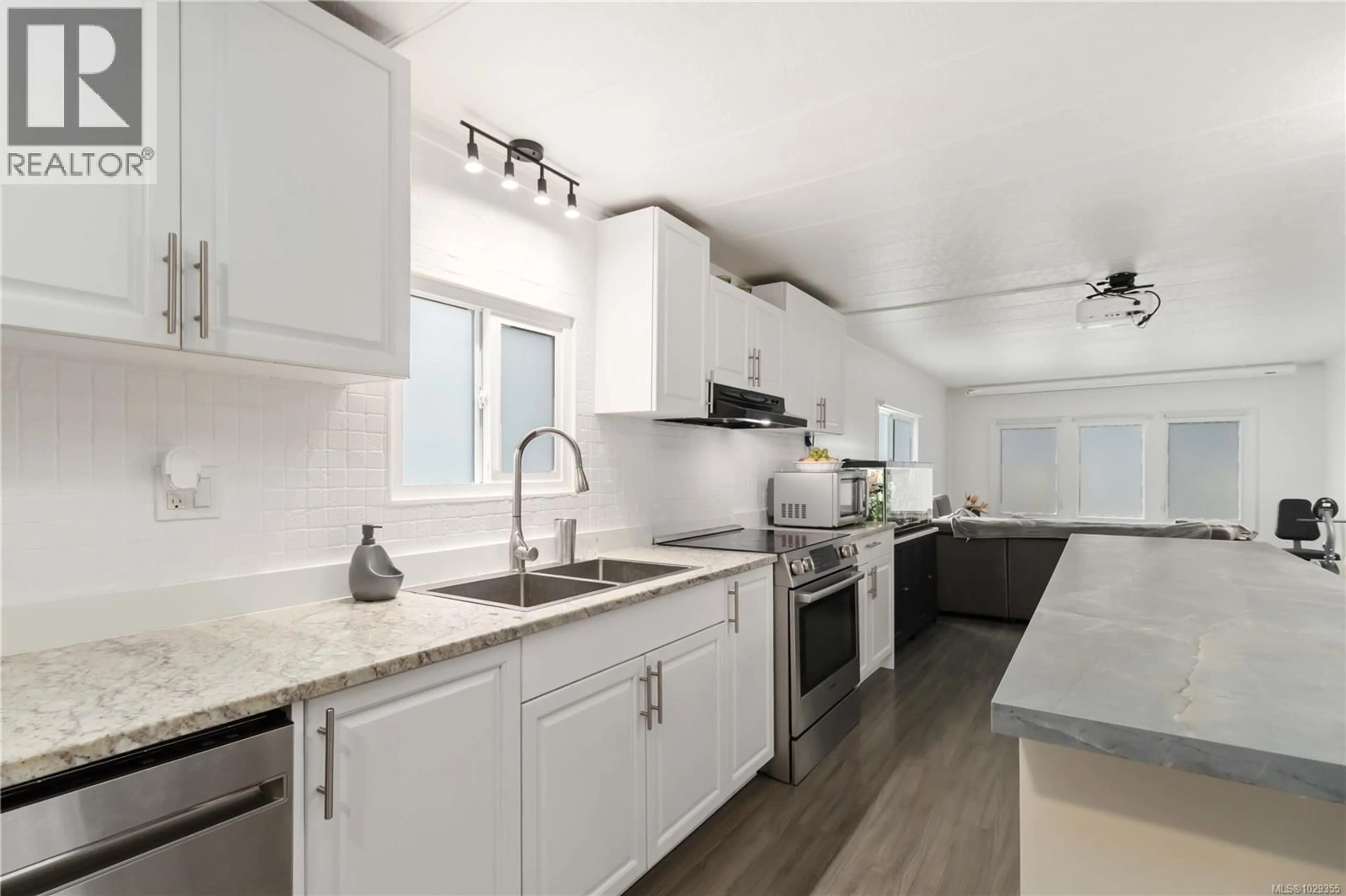 Open concept kitchen, ceramic/tile floor for 52 - 2817 SOOKE LAKE ROAD, Langford British Columbia V9B4P9