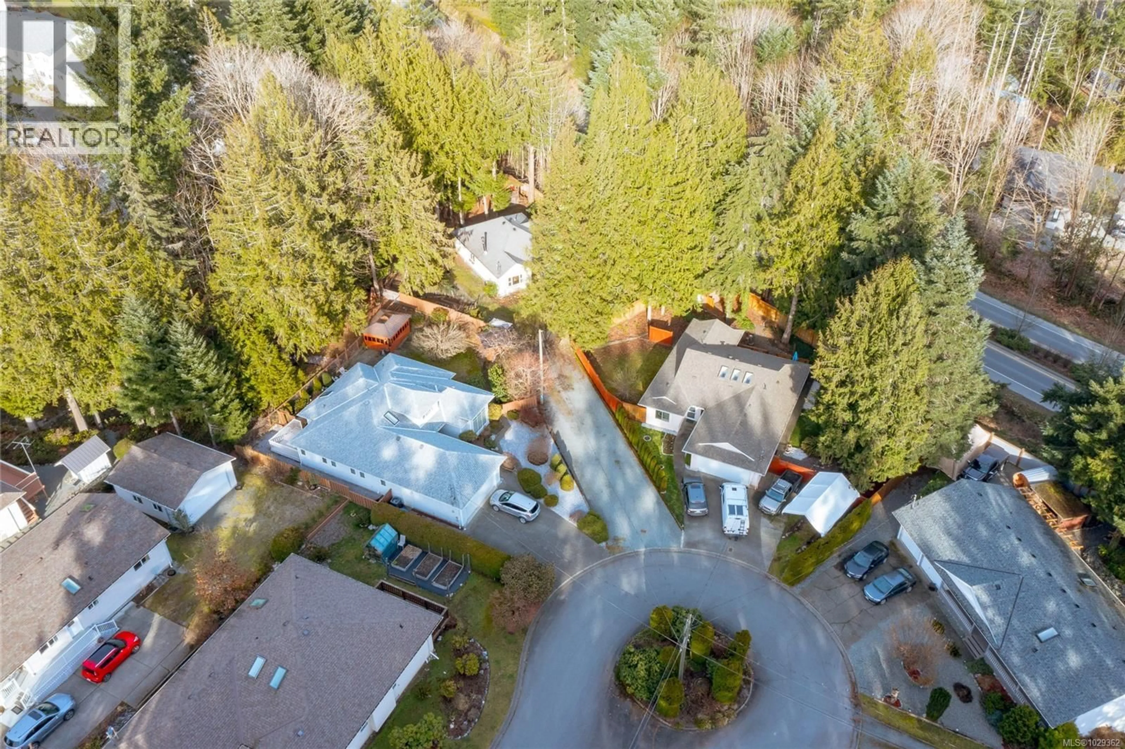 A pic from outside/outdoor area/front of a property/back of a property/a pic from drone, forest/trees view for 195 JOHNSON PLACE, Lake Cowichan British Columbia V0R2G0