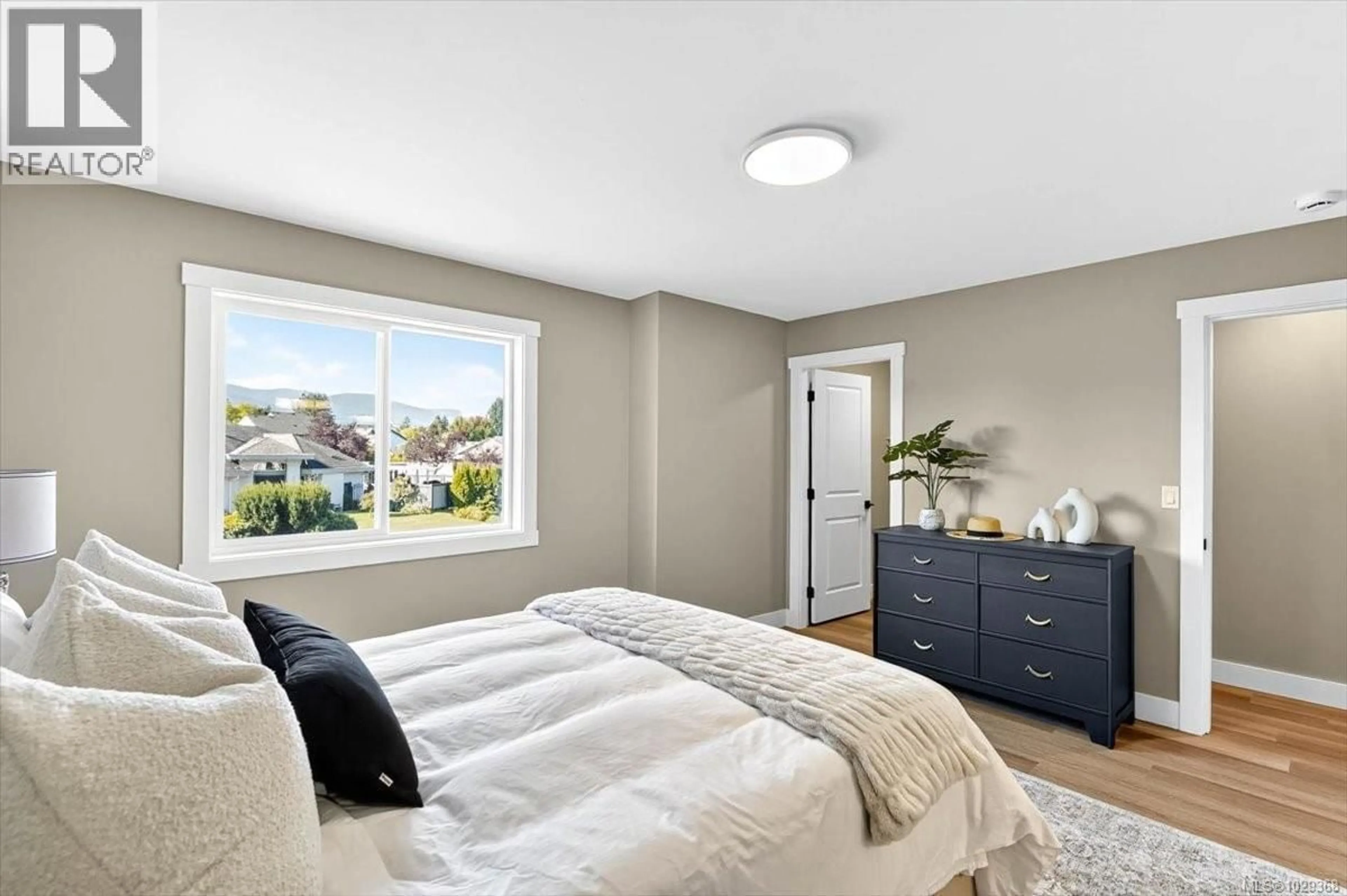 Bedroom with bed, unknown for 104 - 5535 WOODLAND CRESCENT EAST, Port Alberni British Columbia V9Y8E6