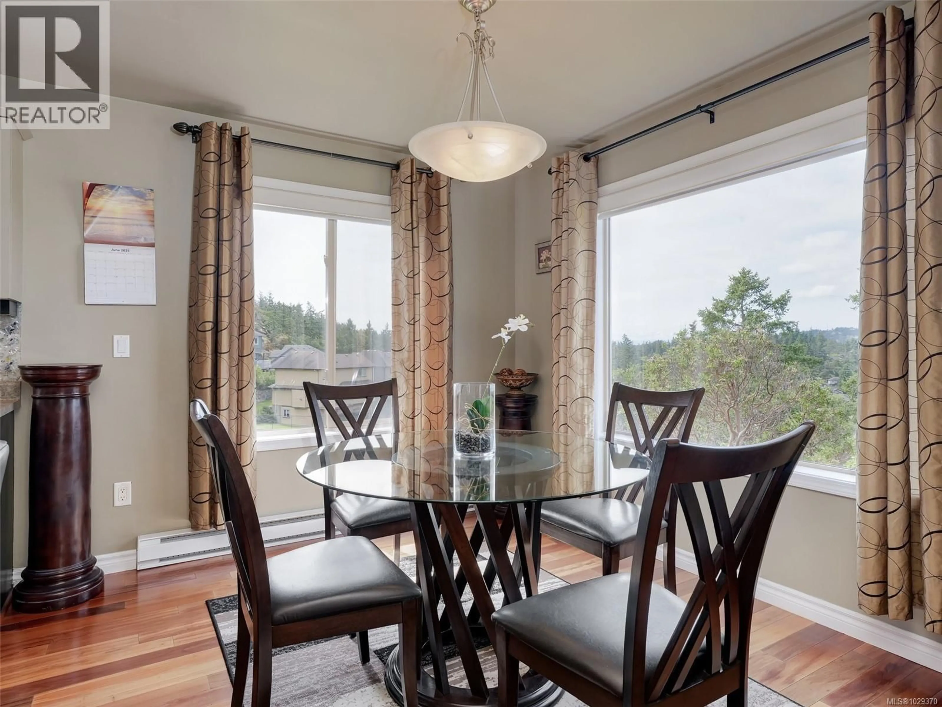 Dining room, wood/laminate floor for 641 OLYMPIA RIDGE, Langford British Columbia V9B6N9