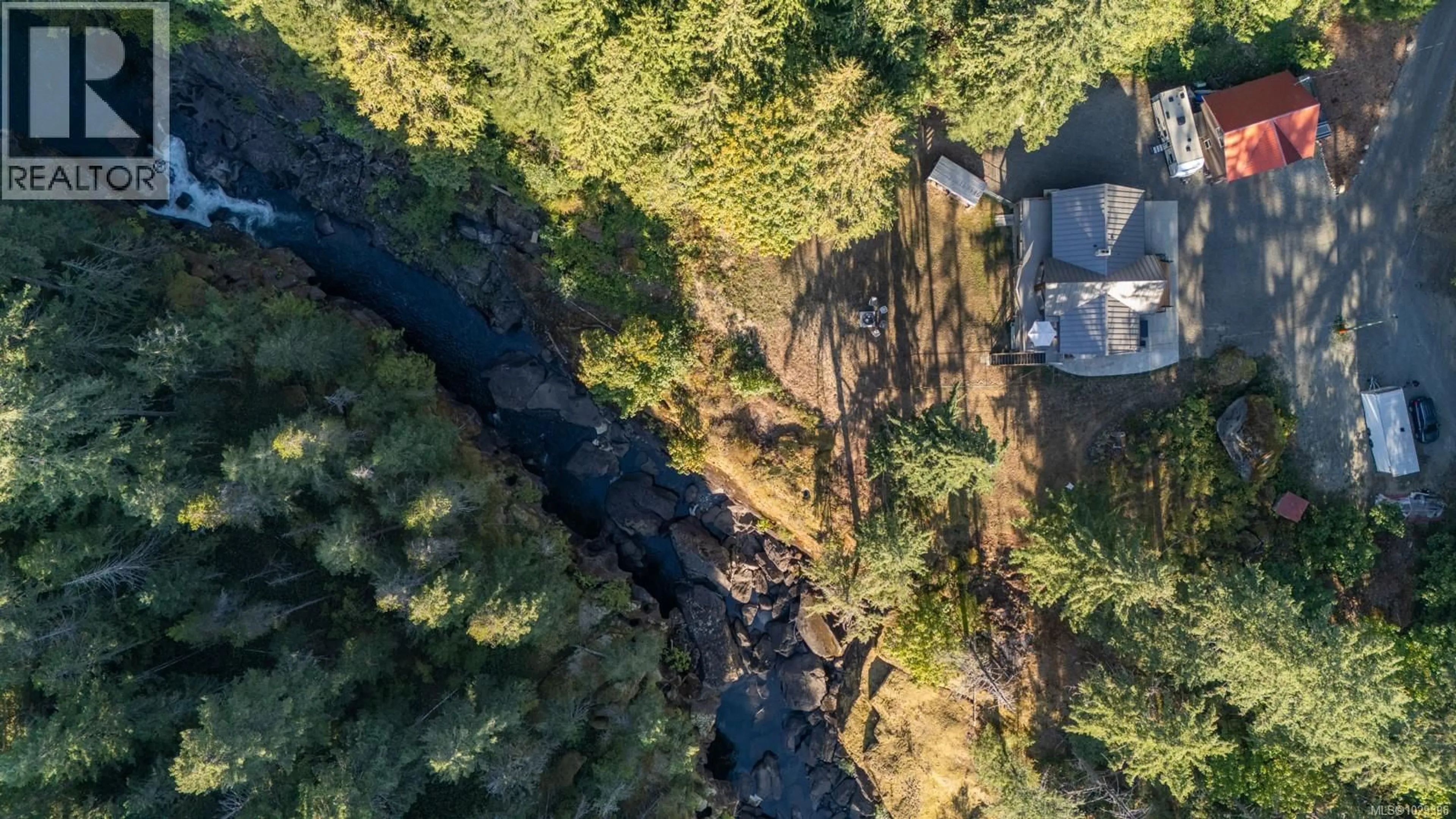 A pic from outside/outdoor area/front of a property/back of a property/a pic from drone, forest/trees view for 995 NANAIMO RIVER ROAD, Nanaimo British Columbia V9X1E5