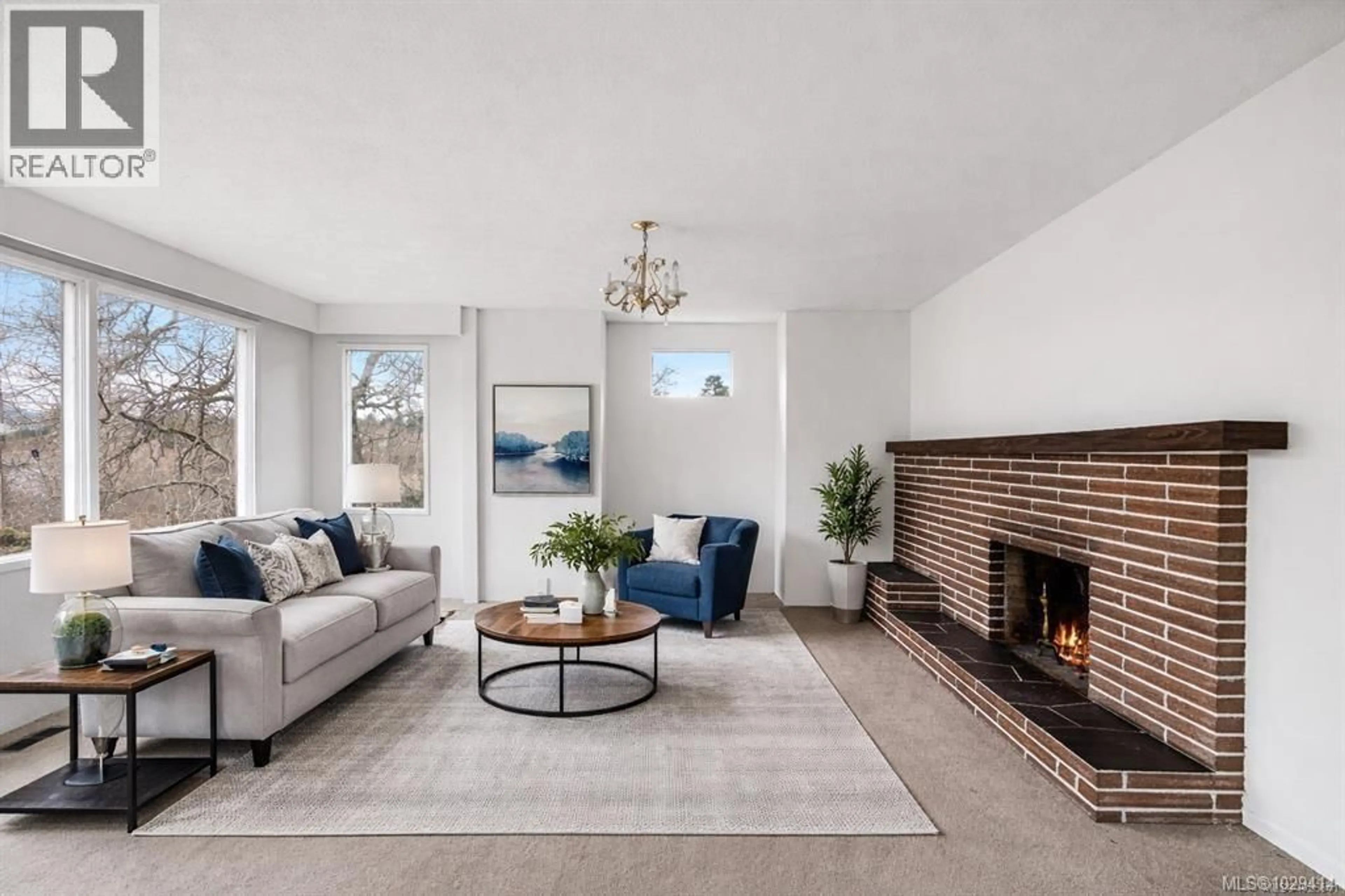 Living room with furniture, ceramic/tile floor for 1085 PRIMROSE ROAD, Saanich British Columbia V8Z4S6