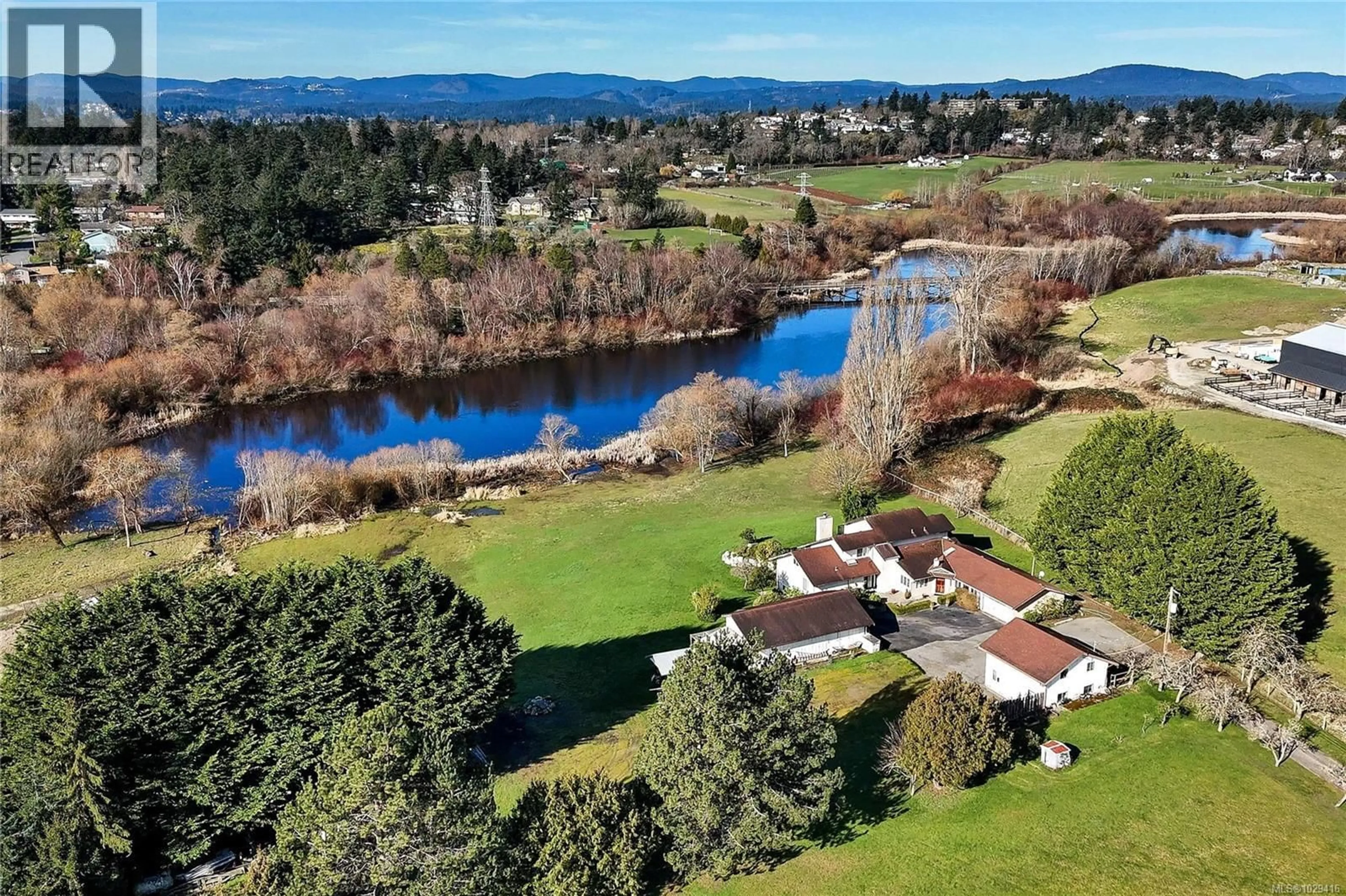 A pic from outside/outdoor area/front of a property/back of a property/a pic from drone, water/lake/river/ocean view for 4220 BLENKINSOP ROAD, Saanich British Columbia V8X2C4