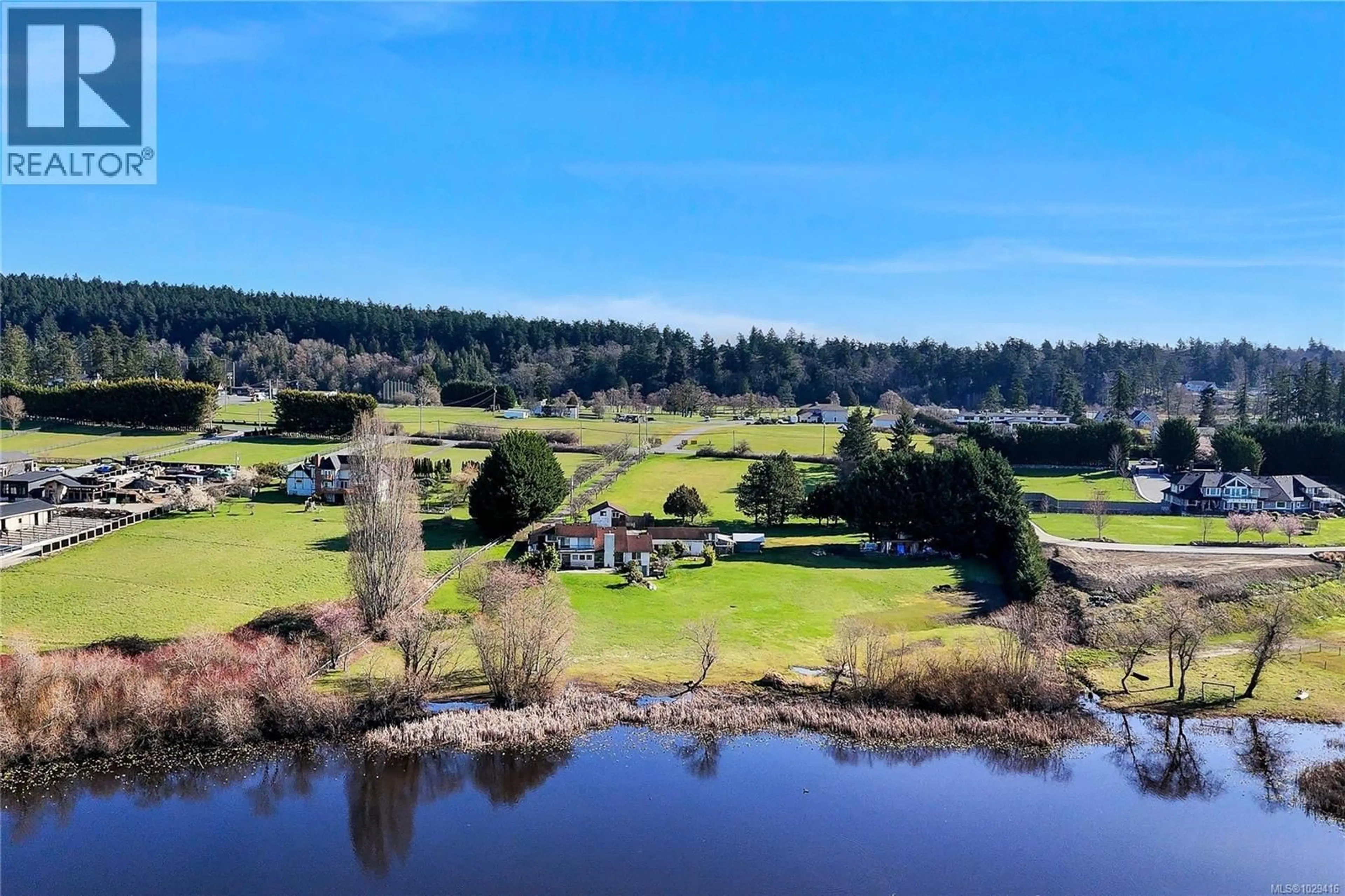 A pic from outside/outdoor area/front of a property/back of a property/a pic from drone, water/lake/river/ocean view for 4220 BLENKINSOP ROAD, Saanich British Columbia V8X2C4