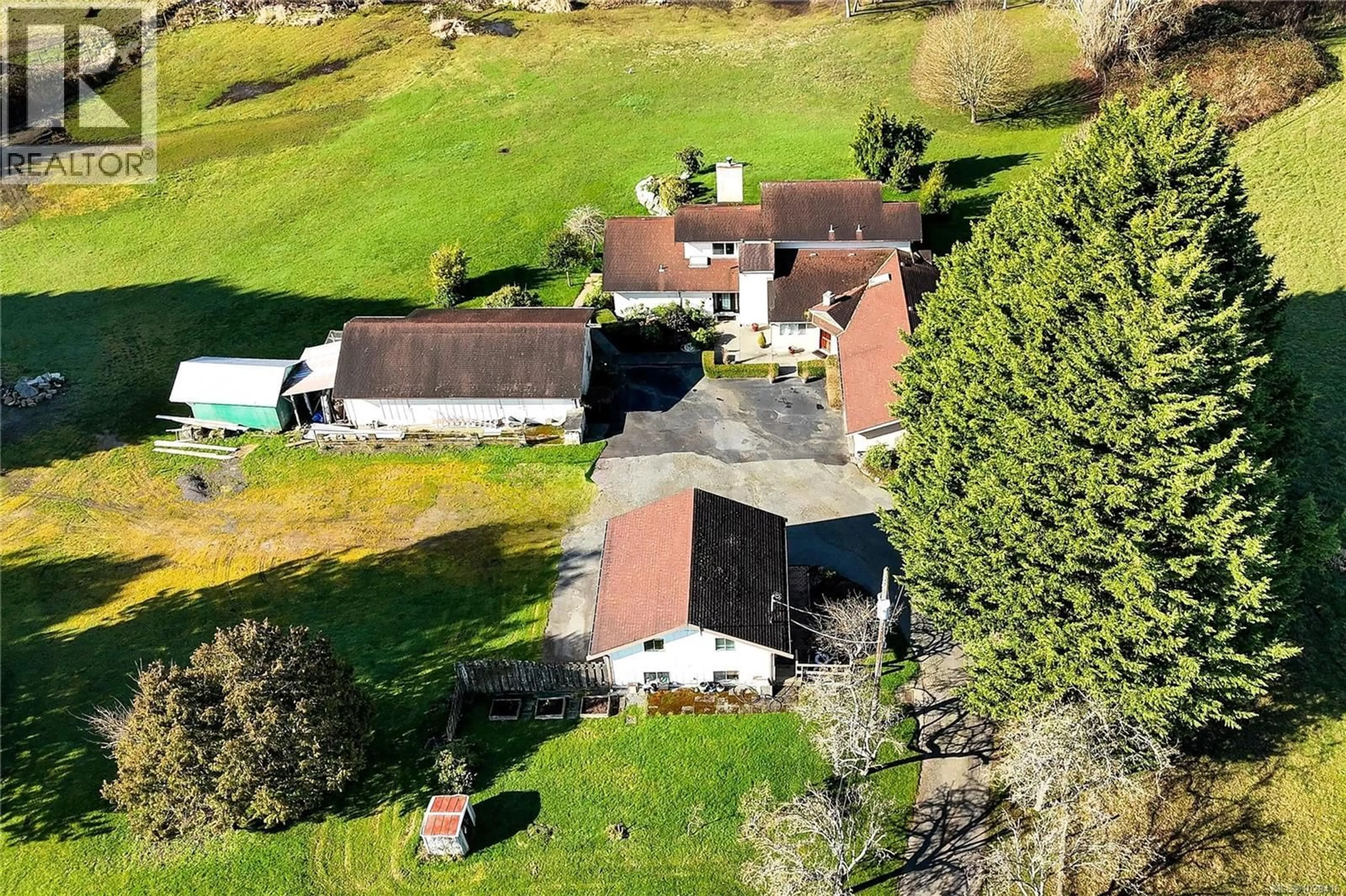 A pic from outside/outdoor area/front of a property/back of a property/a pic from drone, unknown for 4220 BLENKINSOP ROAD, Saanich British Columbia V8X2C4