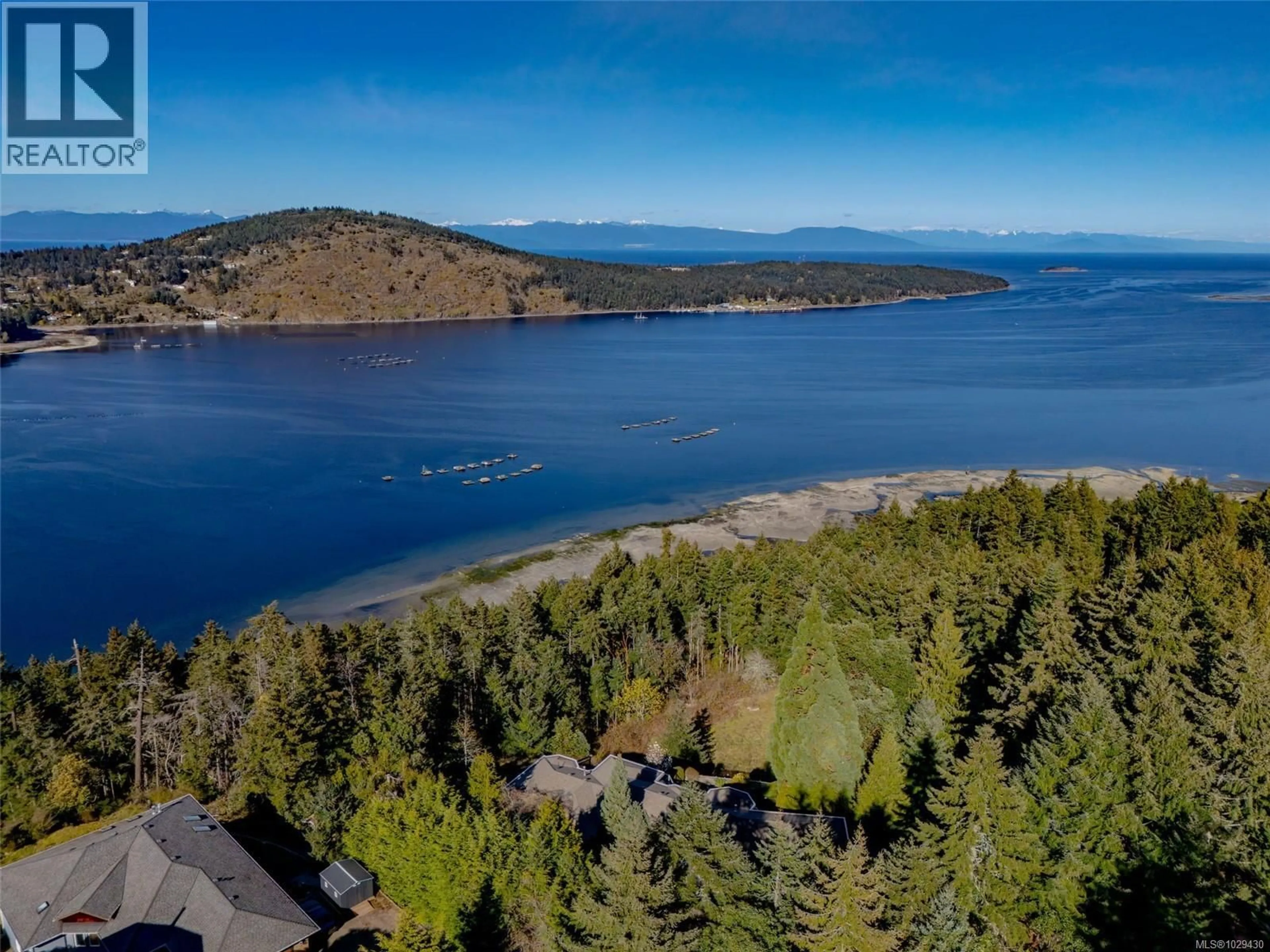 A pic from outside/outdoor area/front of a property/back of a property/a pic from drone, water/lake/river/ocean view for 2685 SEA BLUSH DRIVE, Nanoose Bay British Columbia V9P9E4